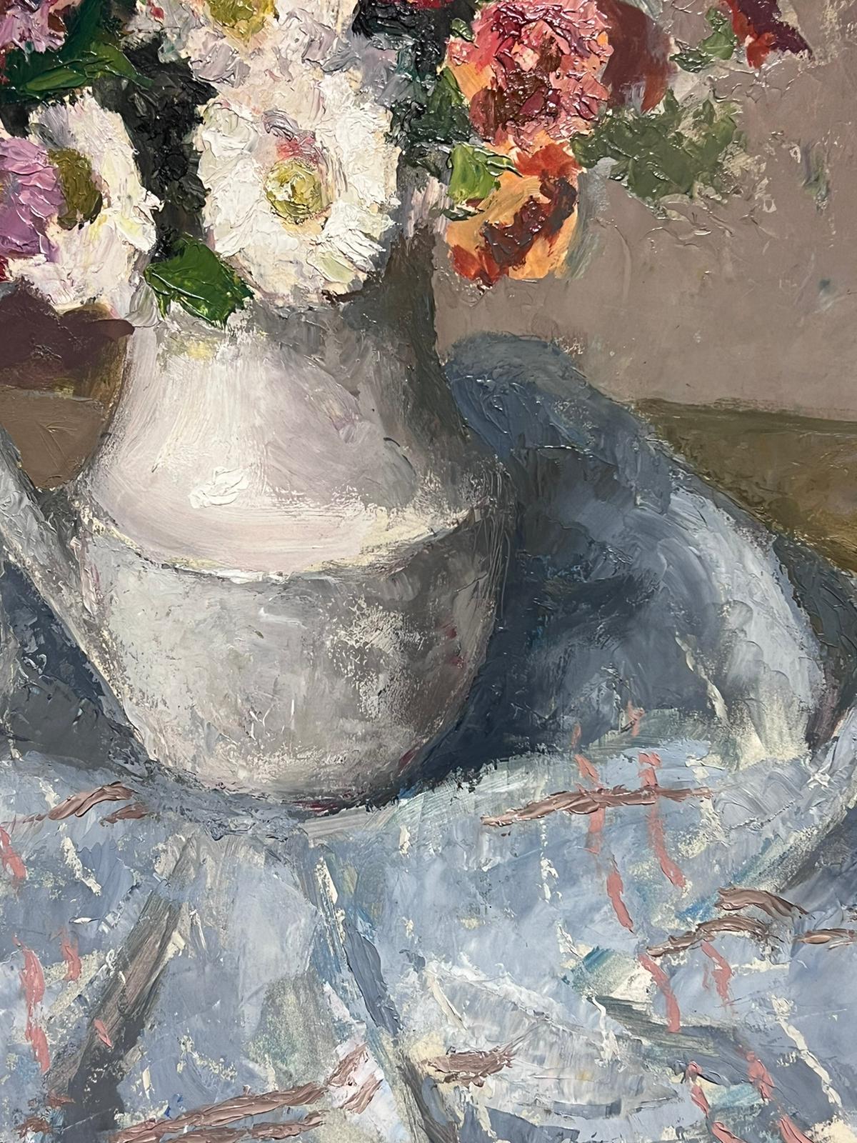 Vibrant Still Life 
Lucien Mostiar
signed oil on canvas, unframed
board: 25.5 x 20 inches
provenance: private collection
condition: very good and sound condition

Description:
This captivating oil painting by Lucien Martial showcases a delicate