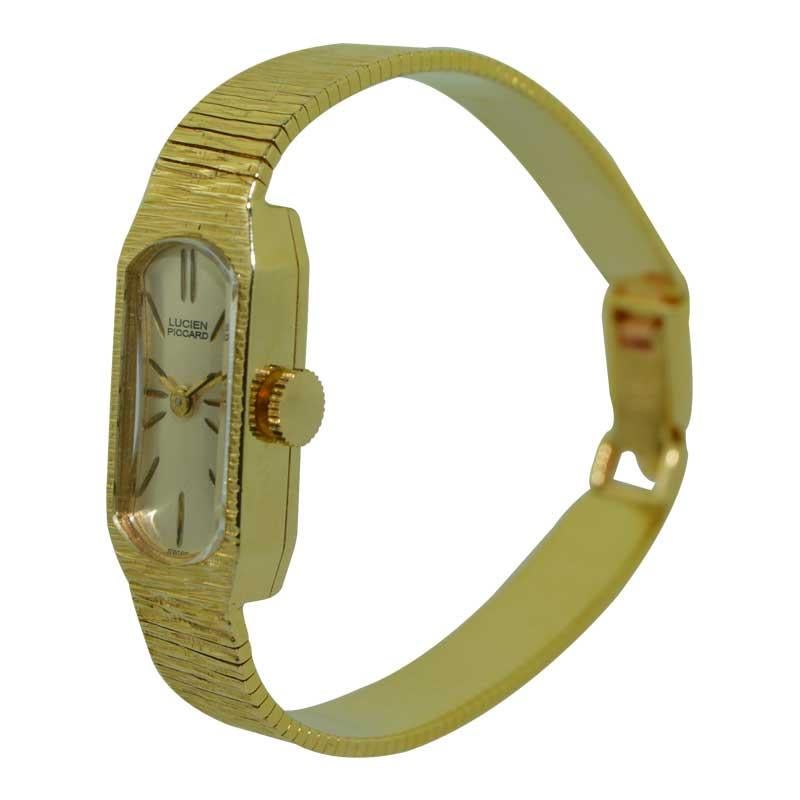 FACTORY / HOUSE: Lucien Piccard 
STYLE / REFERENCE: Mesh Bracelet Watch
METAL / MATERIAL: 14Kt. Solid Yellow Gold
CIRCA / YEAR: 1960's
DIMENSIONS / SIZE: 24mm X 11mm
MOVEMENT / CALIBER: Manual Winding / 17 Jewels 
DIAL / HANDS: Silvered with Baton