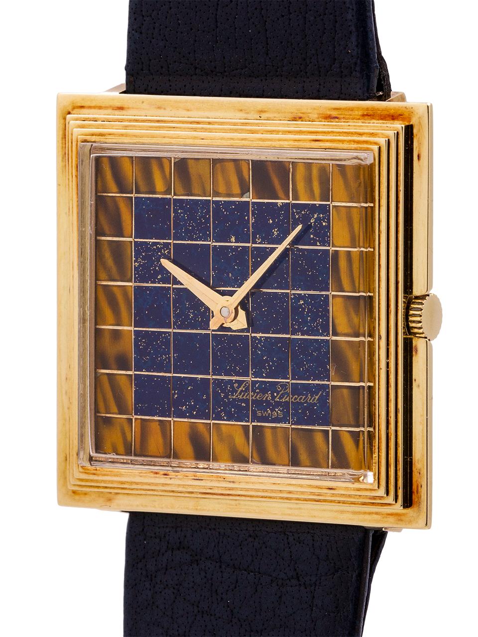 
Stunning and stylish mid century design Lucien Piccard 14K YG manual wind dress model. Featuring a distinctive mint condition 31 X 30mm square case with fine wide, stepped and sloped bezel, and remarkable checkerboard pattern dial with center Lapis