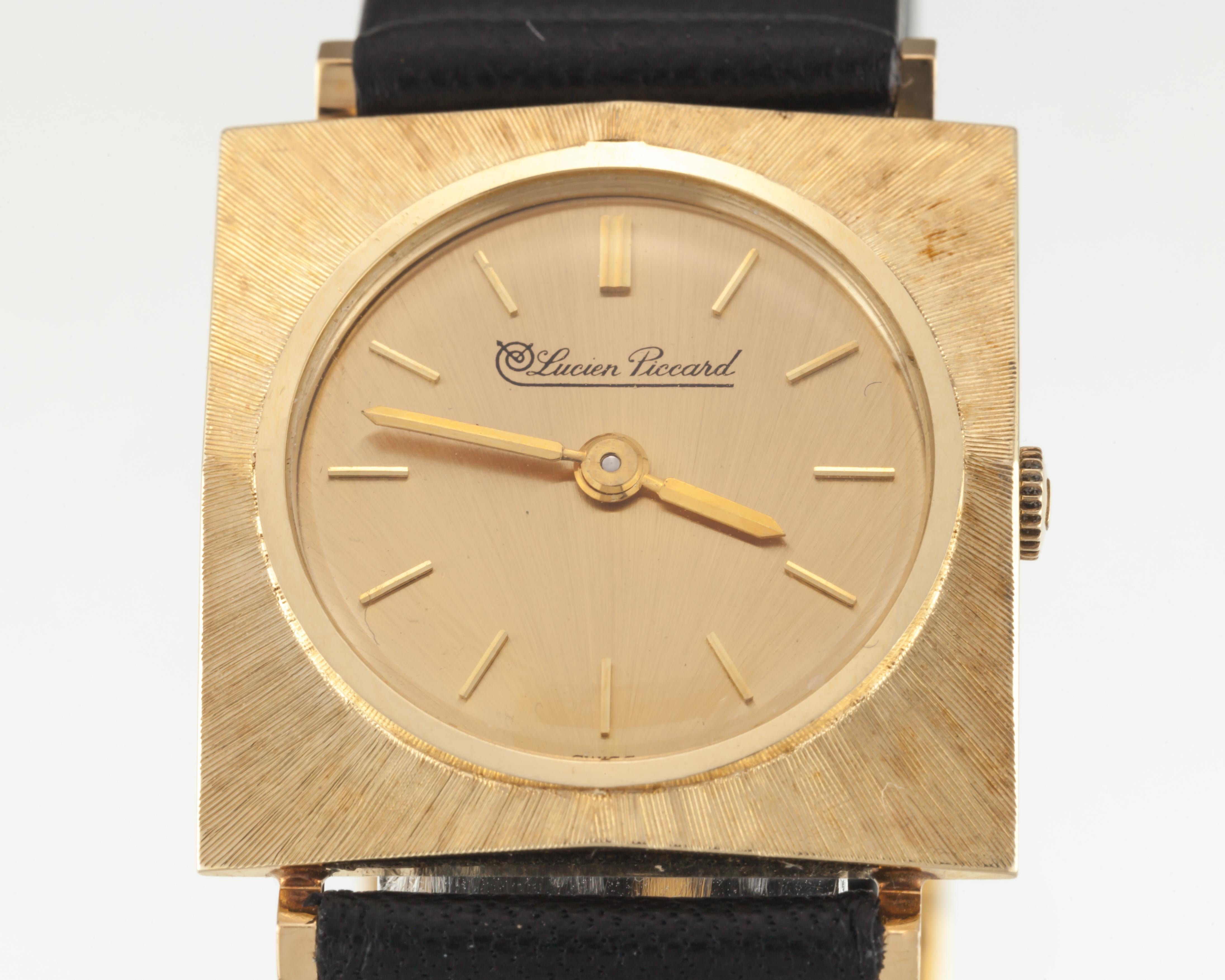 Lucien Piccard 14k Yellow Gold Men's Dress Hand-Winding Watch w/ Leather Band
Movement #C18695
Case #36720

14k Yellow Gold Square Case with Radial Brushed Bezel
26 mm Wide (27 mm w/ Crown)
27 mm Long
Lug-to-Lug Width = 17 mm
Lug-to-Lug Distance =