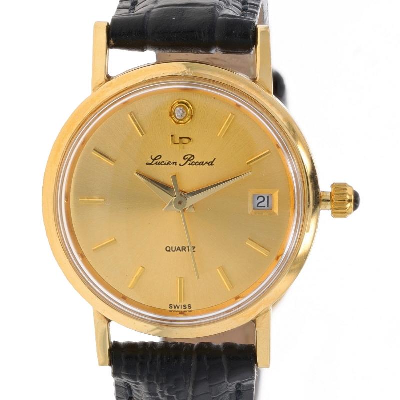 Brand: Lucien Piccard
Movement: Quartz
Movement Maker: Swiss
Dial Color: Gold

Metal Content: 14k Yellow Gold

Stone Information
Natural Diamond

Natural Onyx
Color: Black

Material Information
Genuine Leather
Color: Black

Fastening Type: Buckle