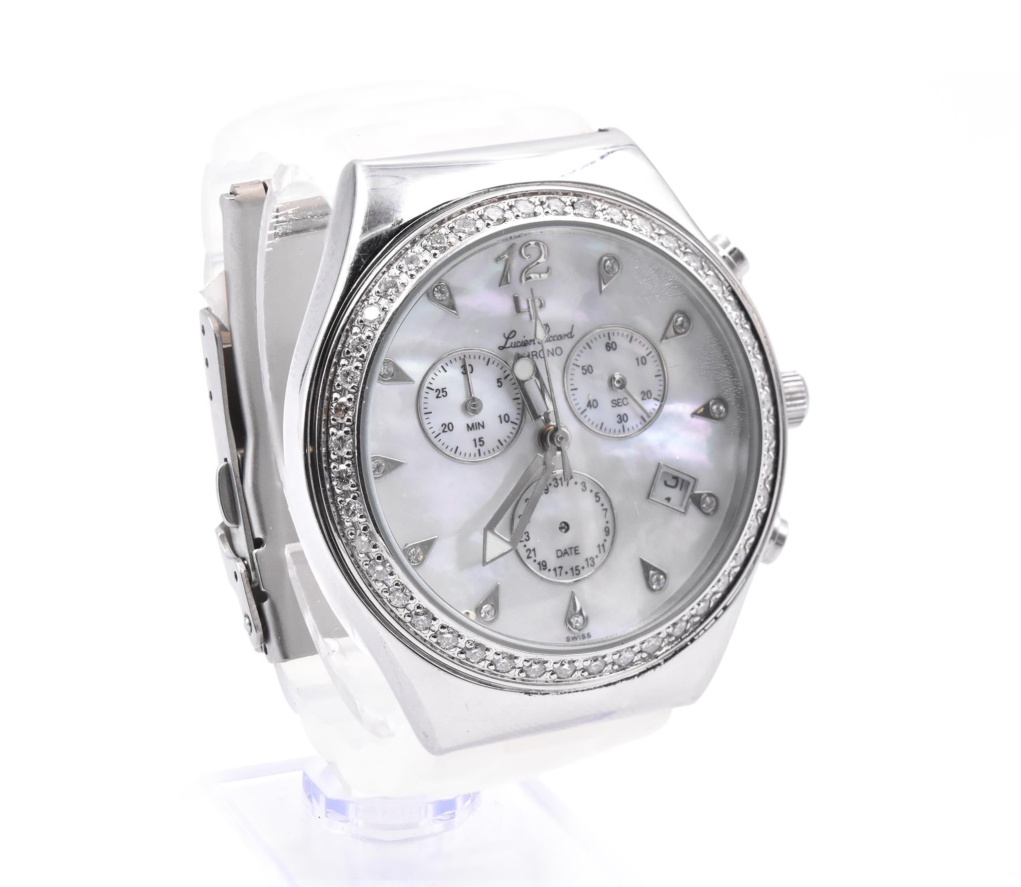Movement: quartz
Function: hours, minutes, seconds, date, chronograph
Case: 40mm round stainless steel case
Band: clear rubber strap, stainless steel clasp
Dial: mother of pearl diamond stick dial
Serial # 2638XXX

No original box and no