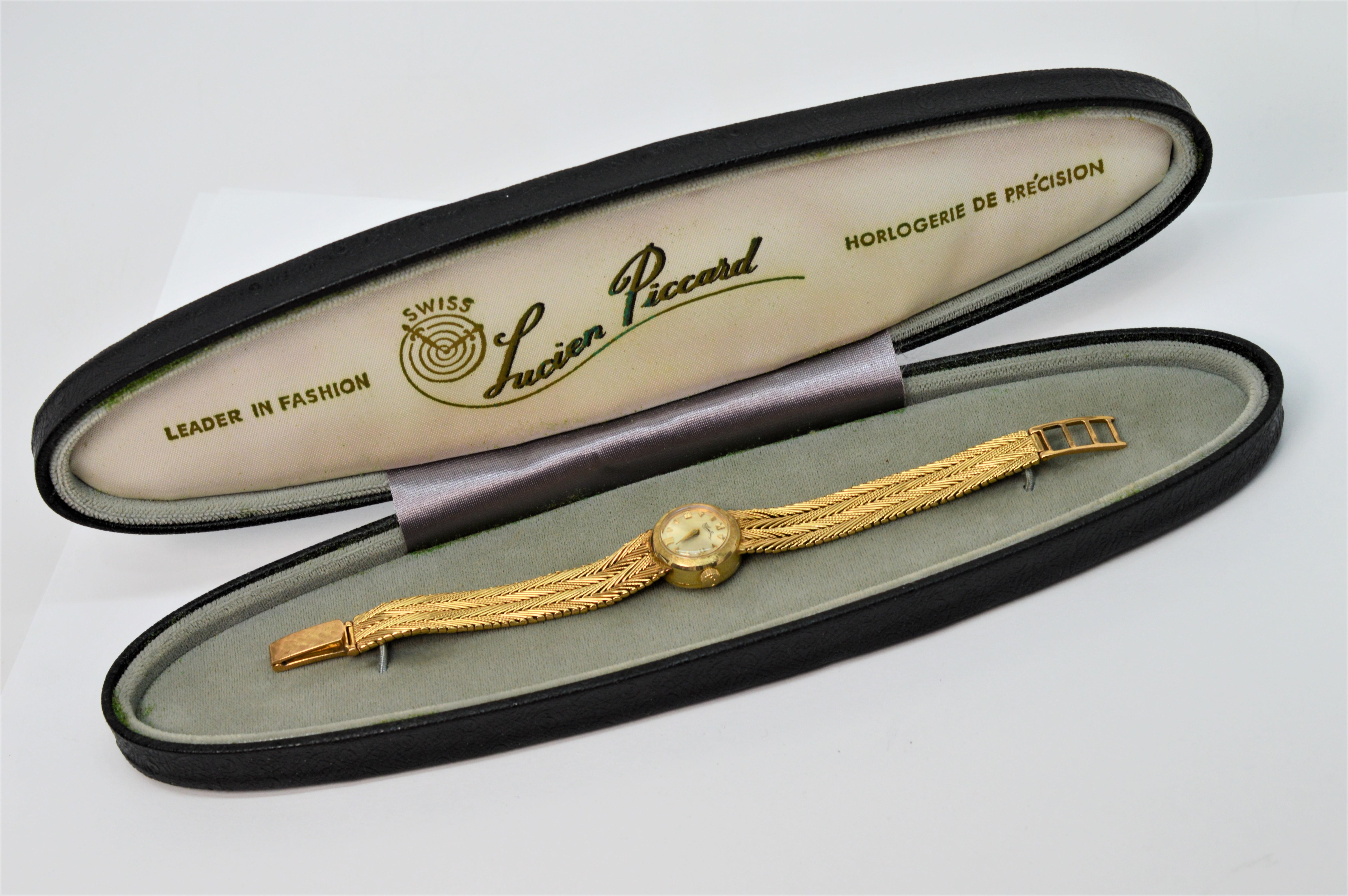 This circa 1960's Ladies Lucien Piccard fourteen karat 14K yellow gold wrist watch delivers true sophistication and functional elegance. The watch's vintage style and proportions make it a versatile piece to complement day or evening wear. With an