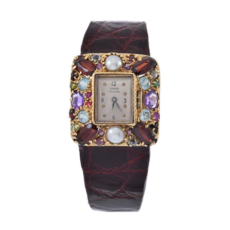 Reloj Lucien Piccard de oro de 14 quilates con piedras preciosas