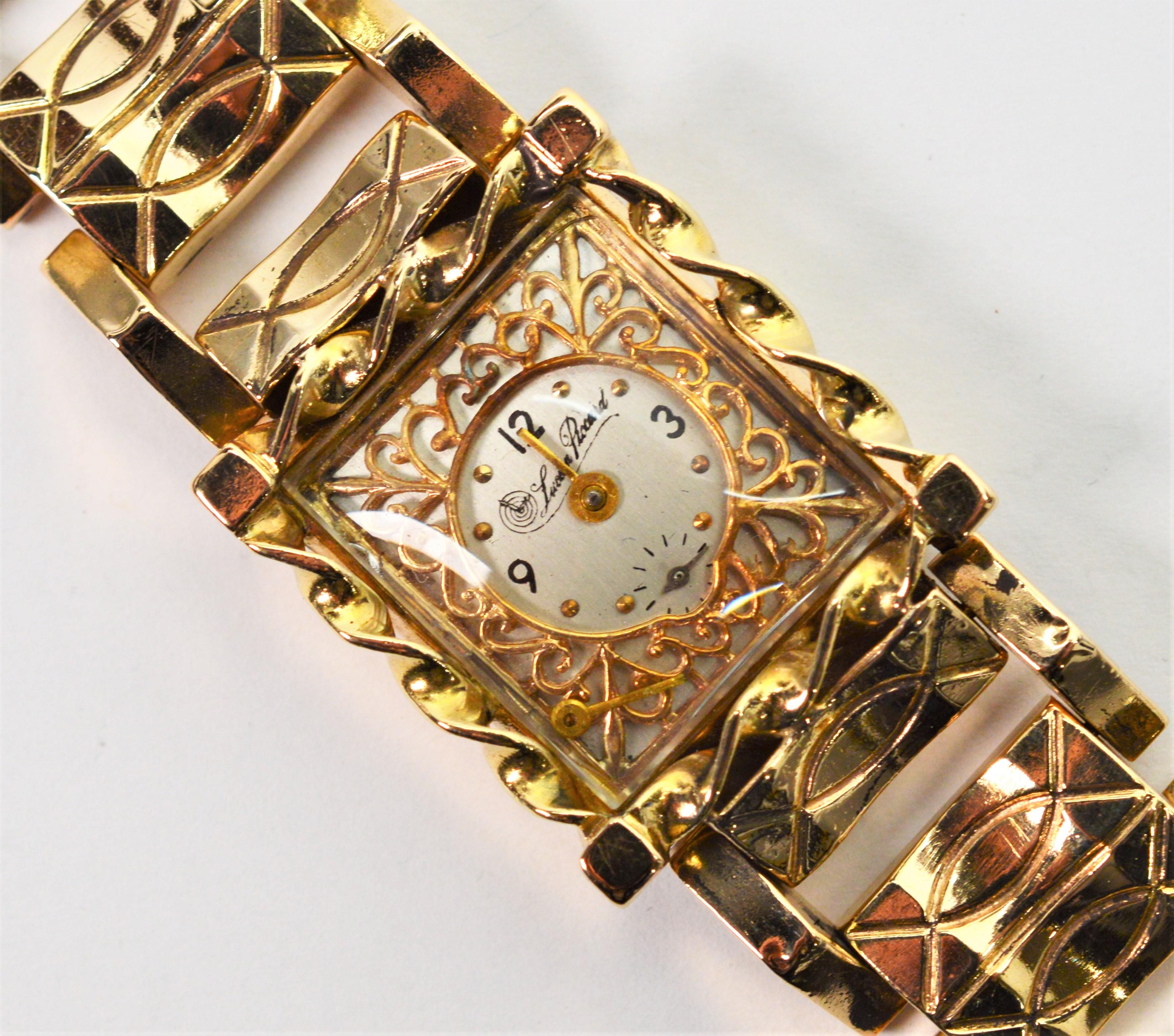 Ein exquisites Erbstück circa Ende der 1940er Jahre Damen Kleid Armband Armbanduhr von Lucien Piccard.  Dieses herausragende Stück wurde von Paul Dilishein entworfen und hat eine einzigartige vierzehn Karat 14K Gelbgold fancy Link Armband, das