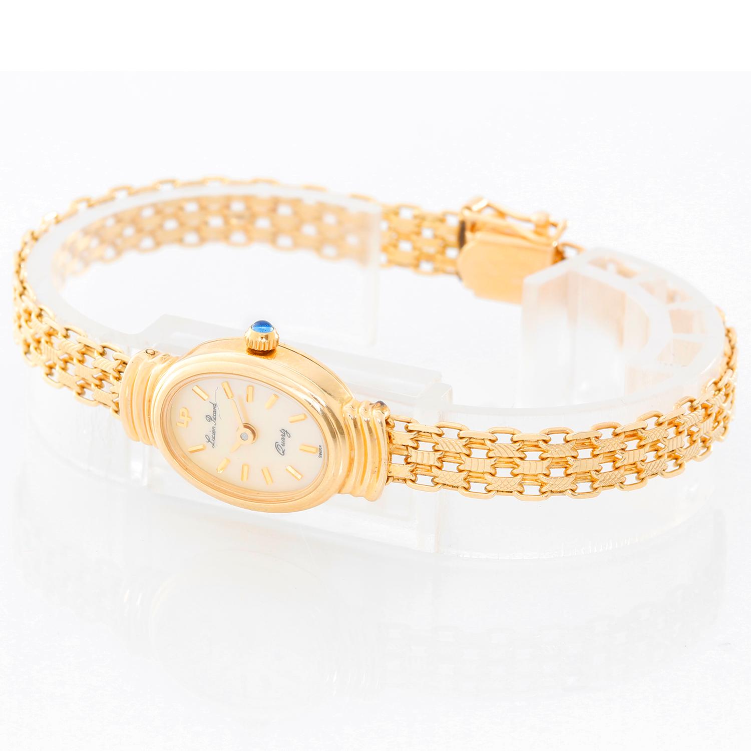 Lucien Piccard Classic 14K Yellow Gold Watch   - Quartz. 14K Yellow gold ( 15 x 19 mm ). Mother of Pearl with stick hour markers . 14K Yellow gold link bracelet with hinged clasp. Pre-owned with custom box . 