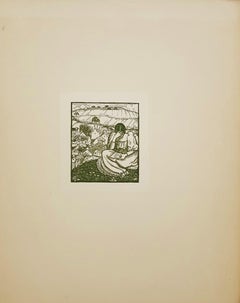 Mädchen lesen auf einem Hügel