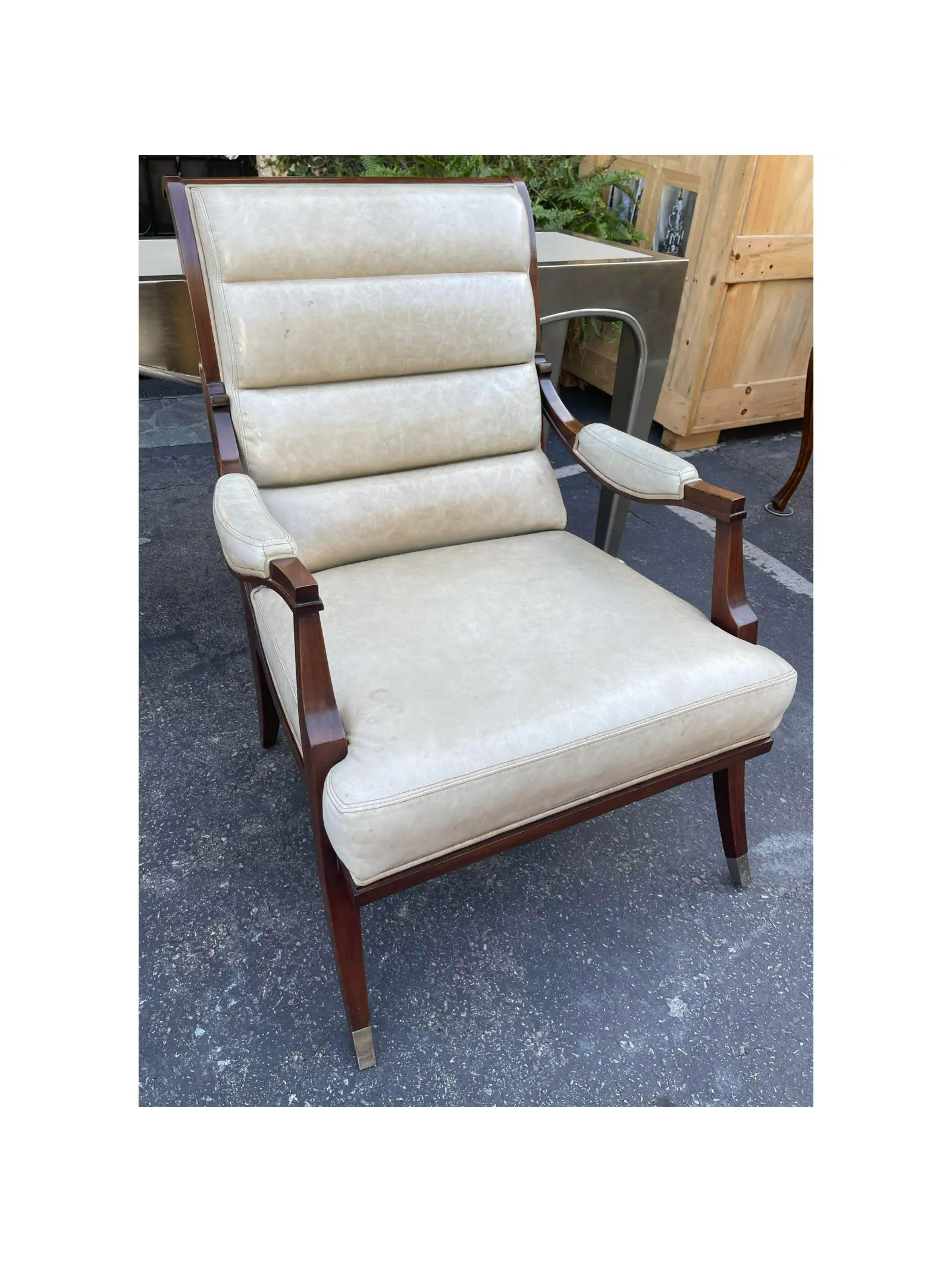 Lucien Rollin Art Deco leather chair. It features an unusual channel tufted back and a dramatic form.

Additional information: 
Materials: Leather
Color: Beige
Brand: William Switzer
Designer: Lucien Rollin
Period: 2000 - 2009
Styles: Art