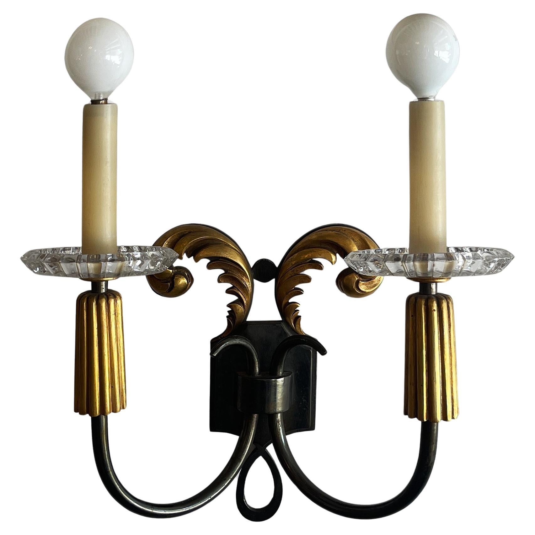 Attributed to Lucien Rollin, France, 1940.

Elegant pair of 1940s era French wall lamps - sconces in cast bronze and glass.
Amazing fabrication and detail. Assembled with screws, cast bronze acanthus leaf, molded textured glass plates.

Original