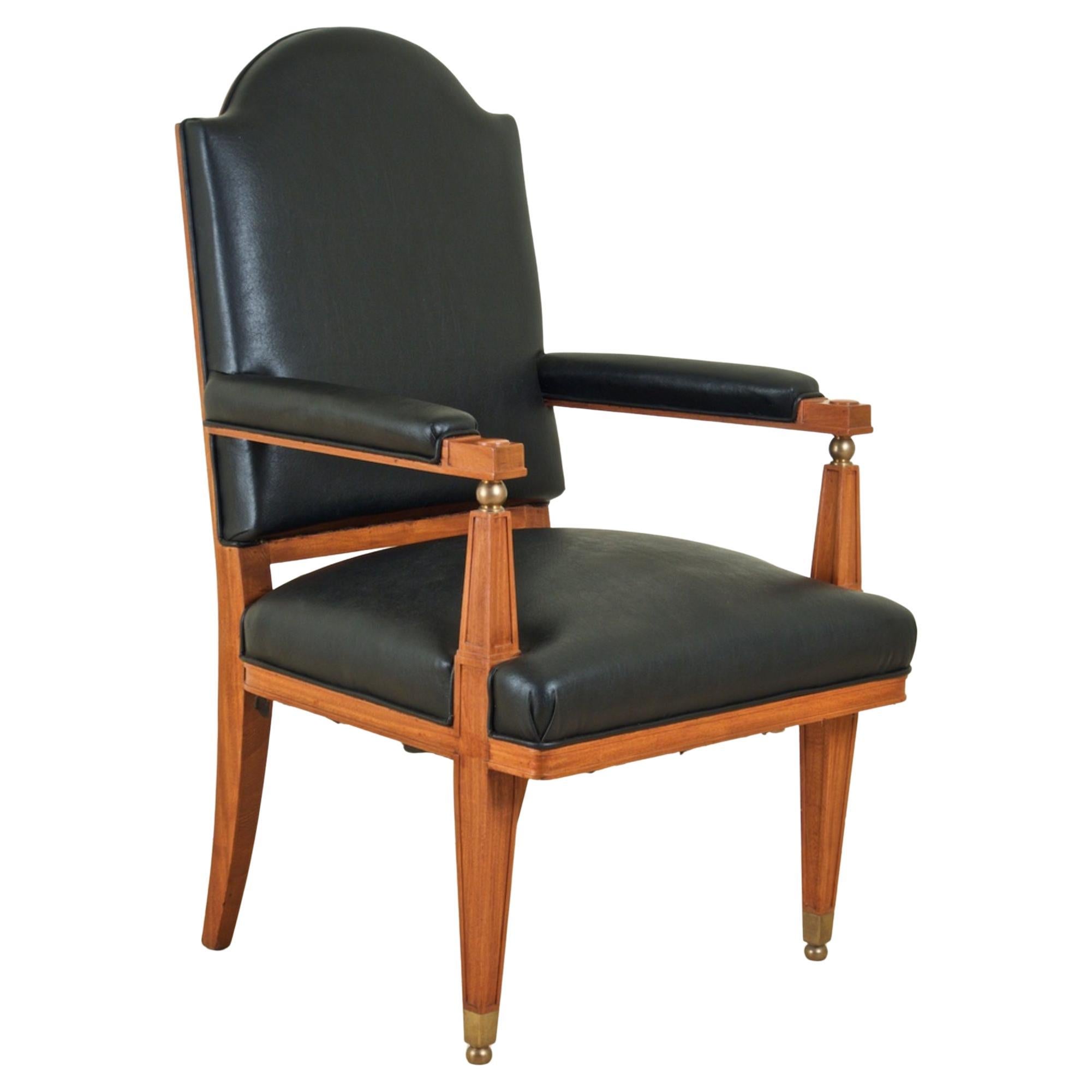 Lucien Rollin Trois fauteuils en bois satiné et bronze