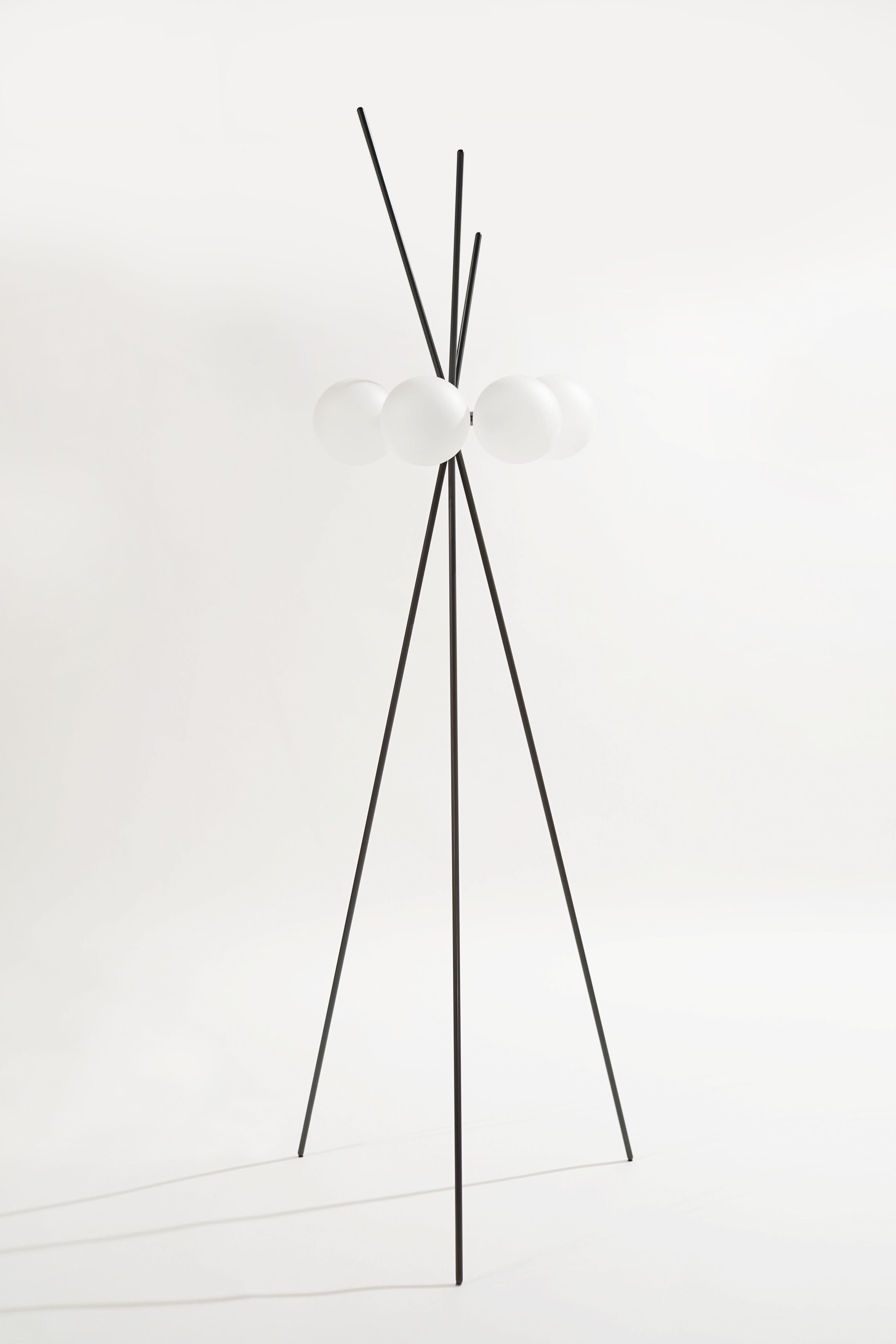 The Lucienne Floor Lamp; is a playful piece of functional sculpture inspired by the fabric designs of Lucienne Day.
 
A note on the design: Blueprint lighting's Chief Luminary, Kelly Aaron, opened her first Mid-Century Modern design store in 1999