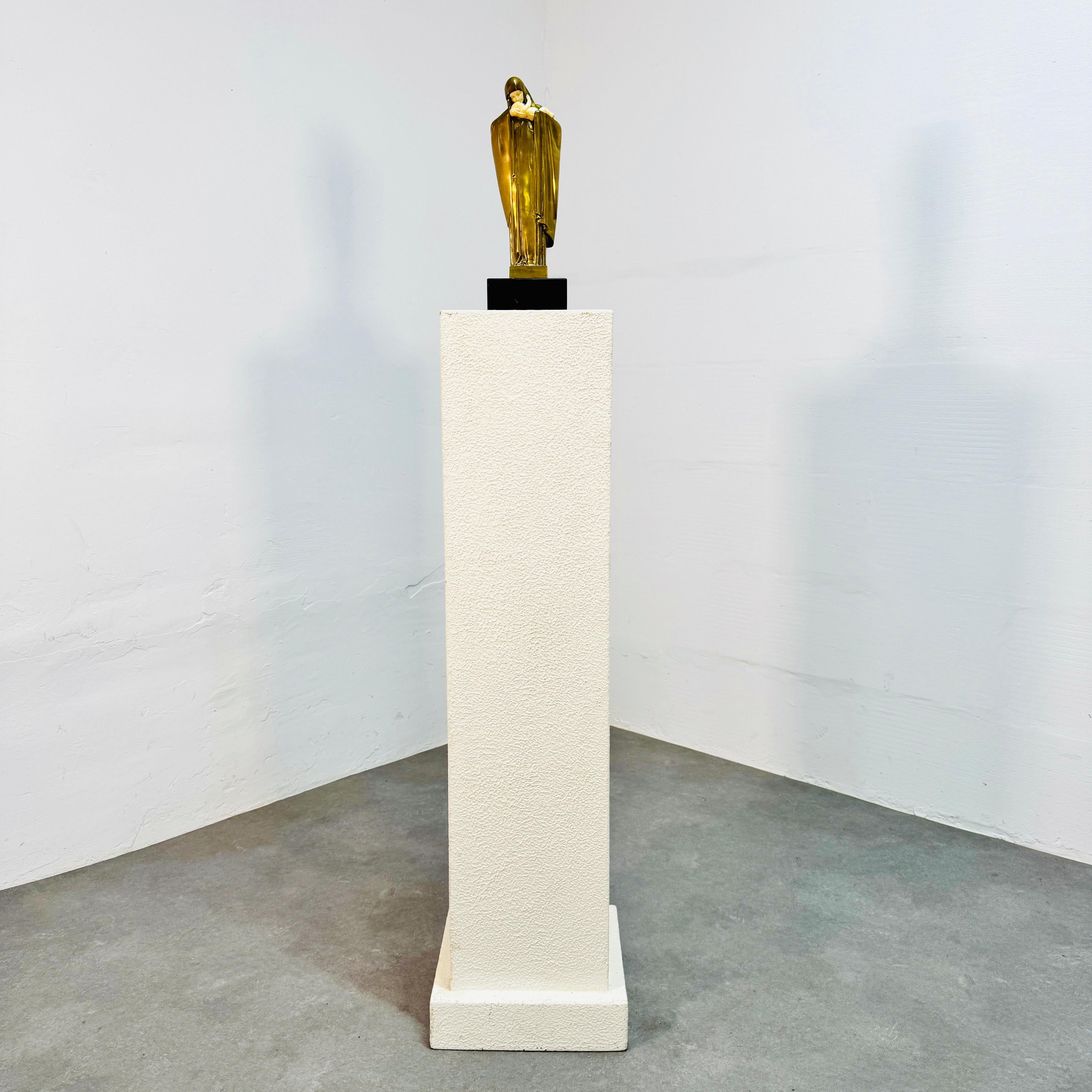 Notre-Dame d'Espérance / Our Lady of Hope.

A wonderful patinated bronze sculpture by Lucienne Antoinette Heuvelmans (Paris 1885-1945) c. 1920. 

The sculpture is gilded bronze and chryselephantine. 
It stands, unattached, on a marble pedestal.