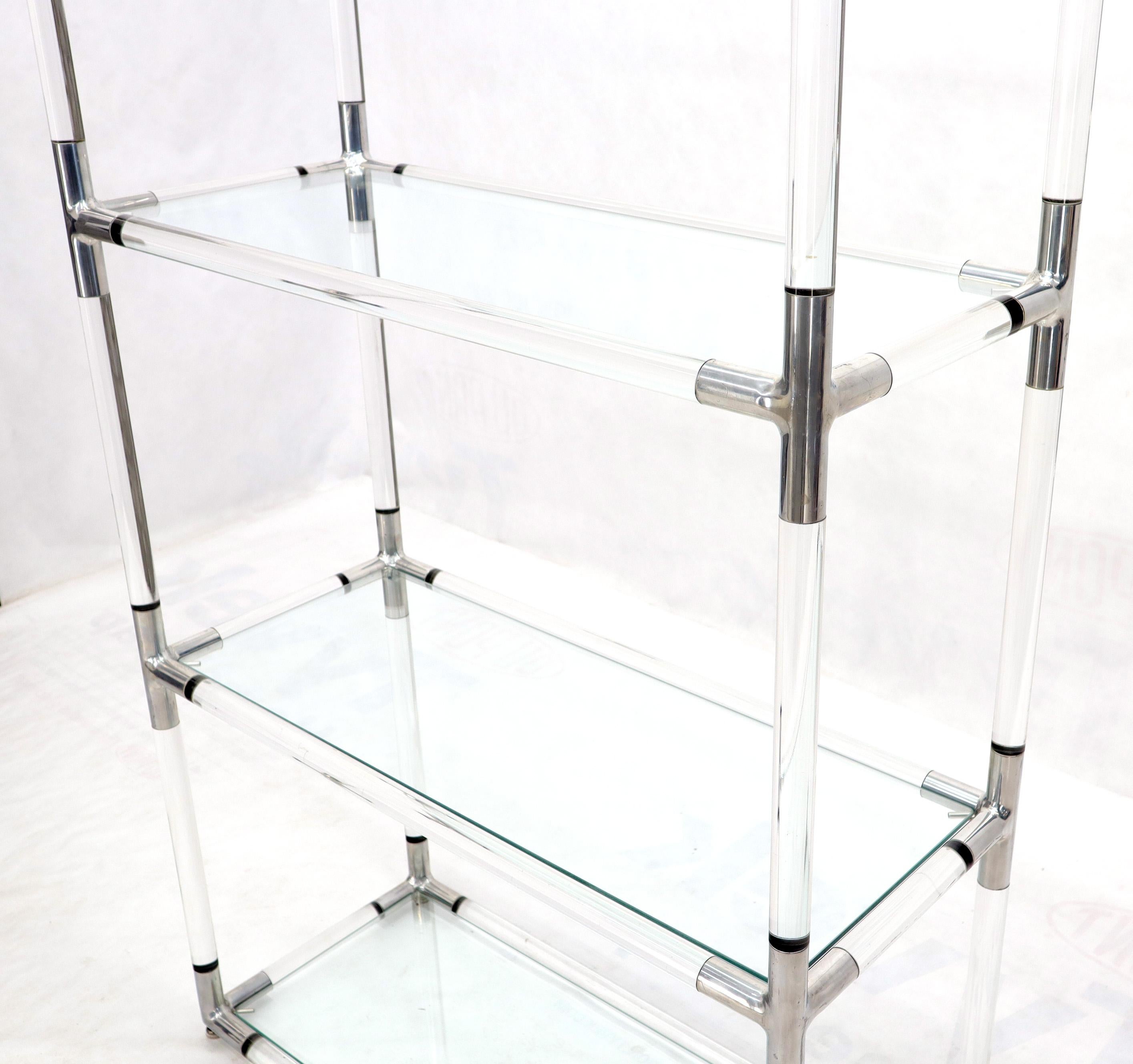 Mid-Century Modern 5-tier Lucite and glass etagere. Possibly designed by Charles Hollis Johnes.