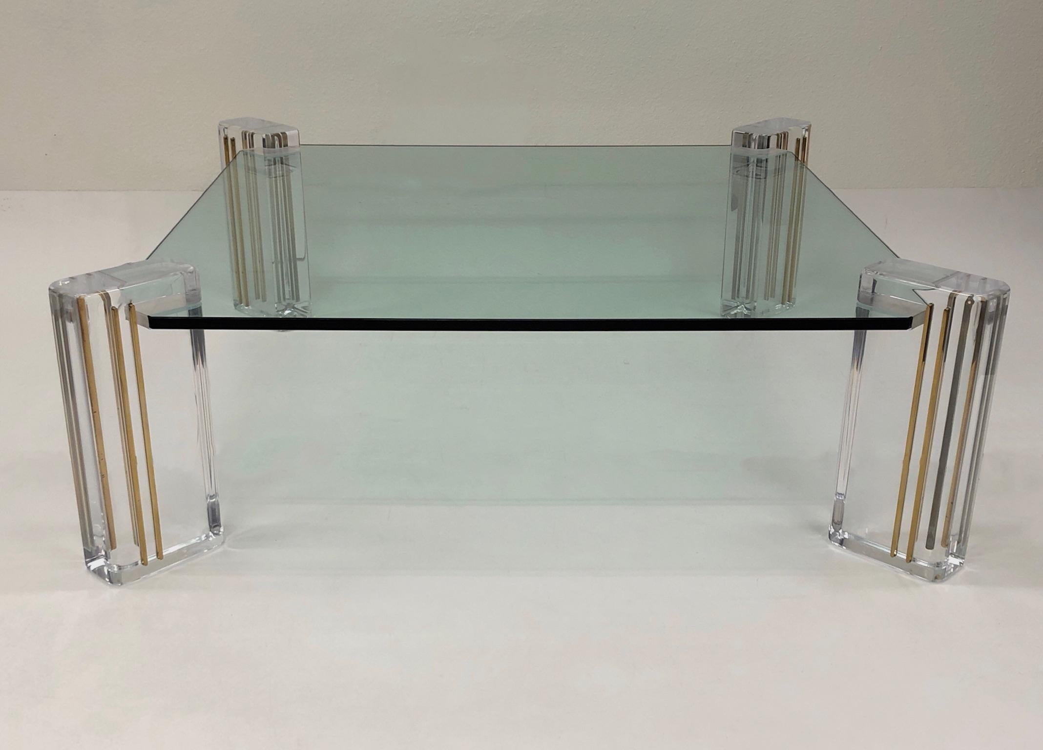 Late 20th Century Lucite and Brass Cocktail Table by Karl Springer