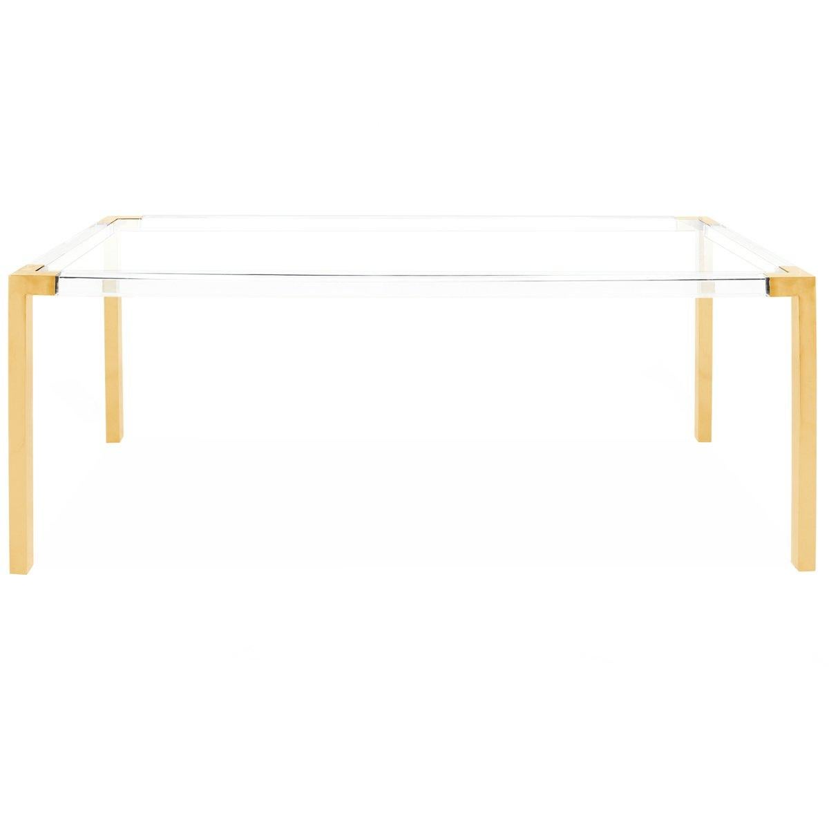 This dining table is a show stopper! Featuring a Lucite frame with shiny brass detail on legs and a glass inset top. Can also be used as a desk.
Measures: 84