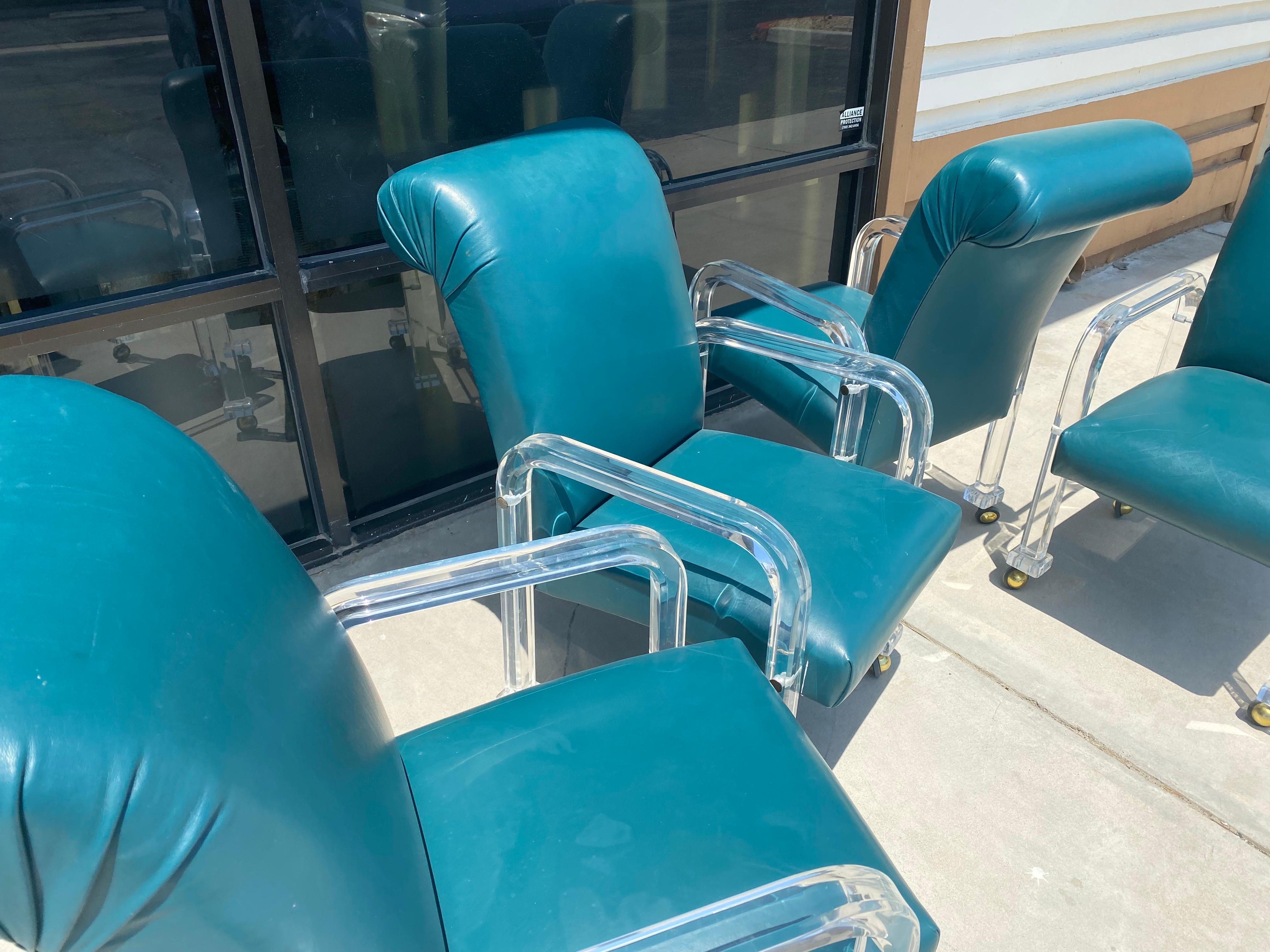 Modern Vintage Lucite and Emerald Green Leather Set of 4 Dining/Game Chairs on Casters For Sale