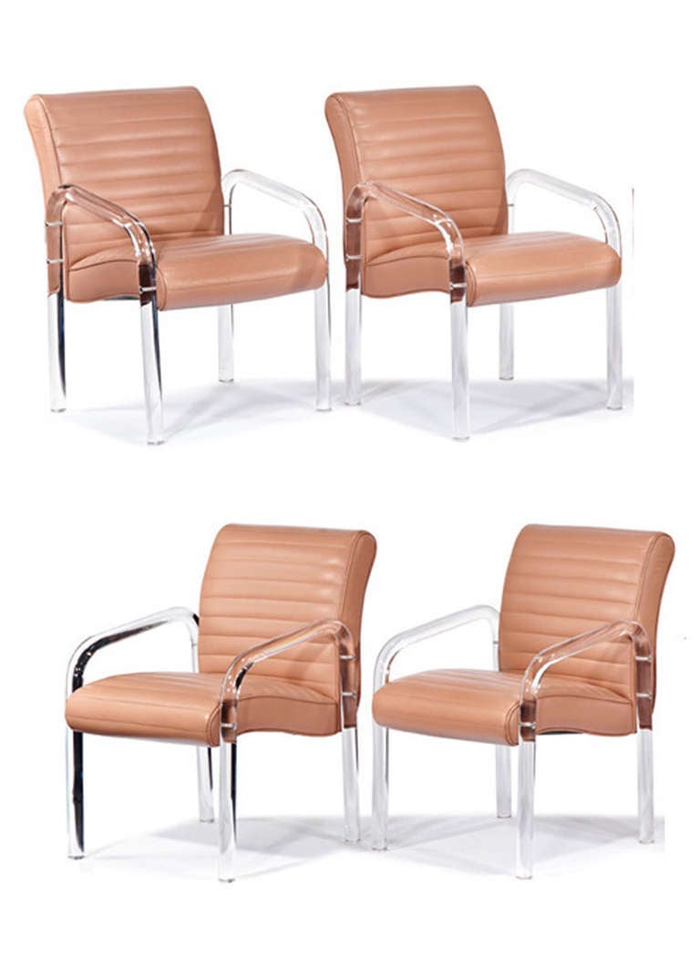 Six fauteuils de salle à manger en cuir avec Lucite courbé par Leon Frost pour la Lion in Frost Company, circa 1975. Signé dans la Lucite.
 
Nous avons deux autres tissus de couleur camel.