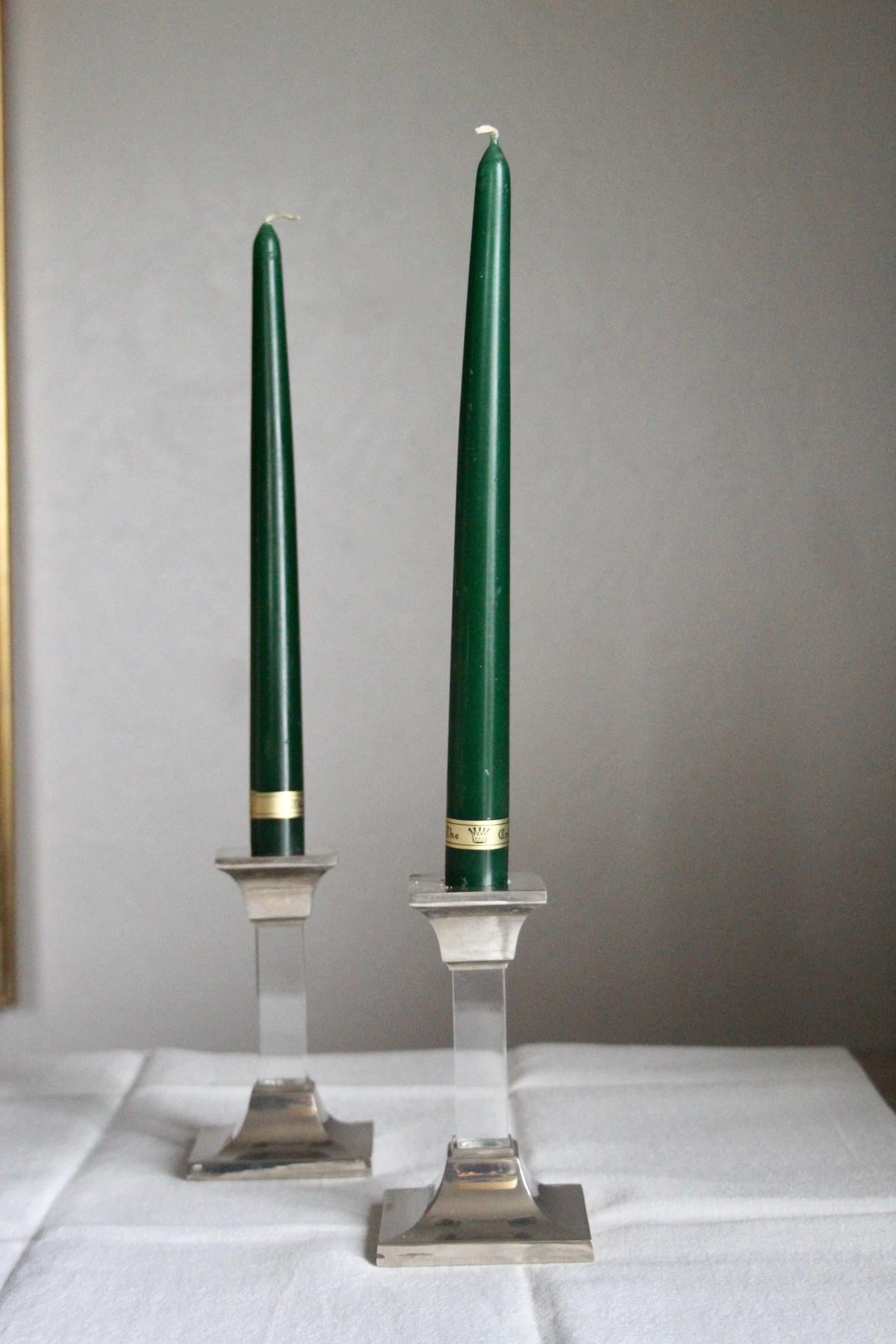 Lucite and metal pair of candlestick.