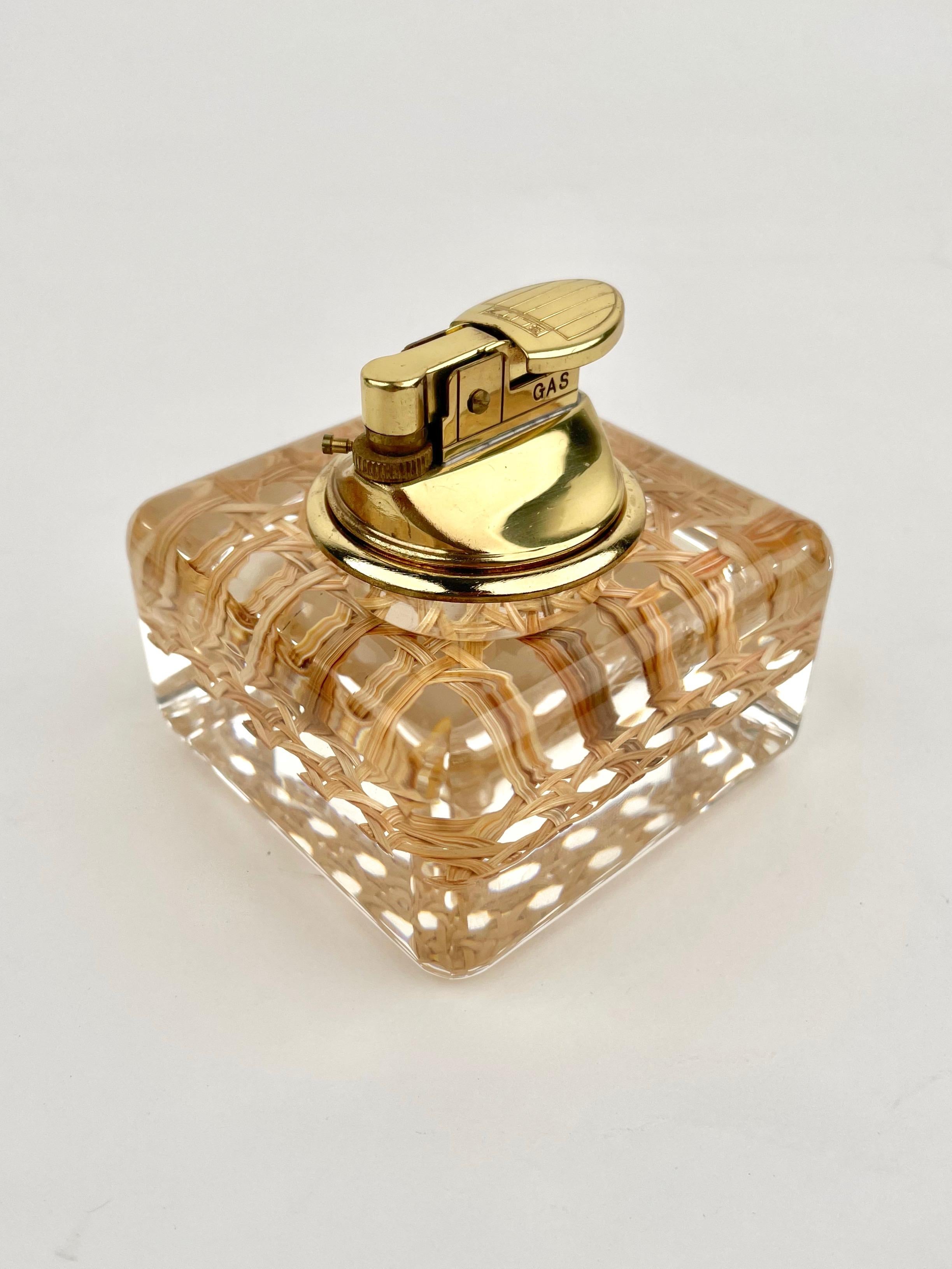 Table lighter in wicker and Lucite in Christian Dior Style. Made in Italy in the 1970s.