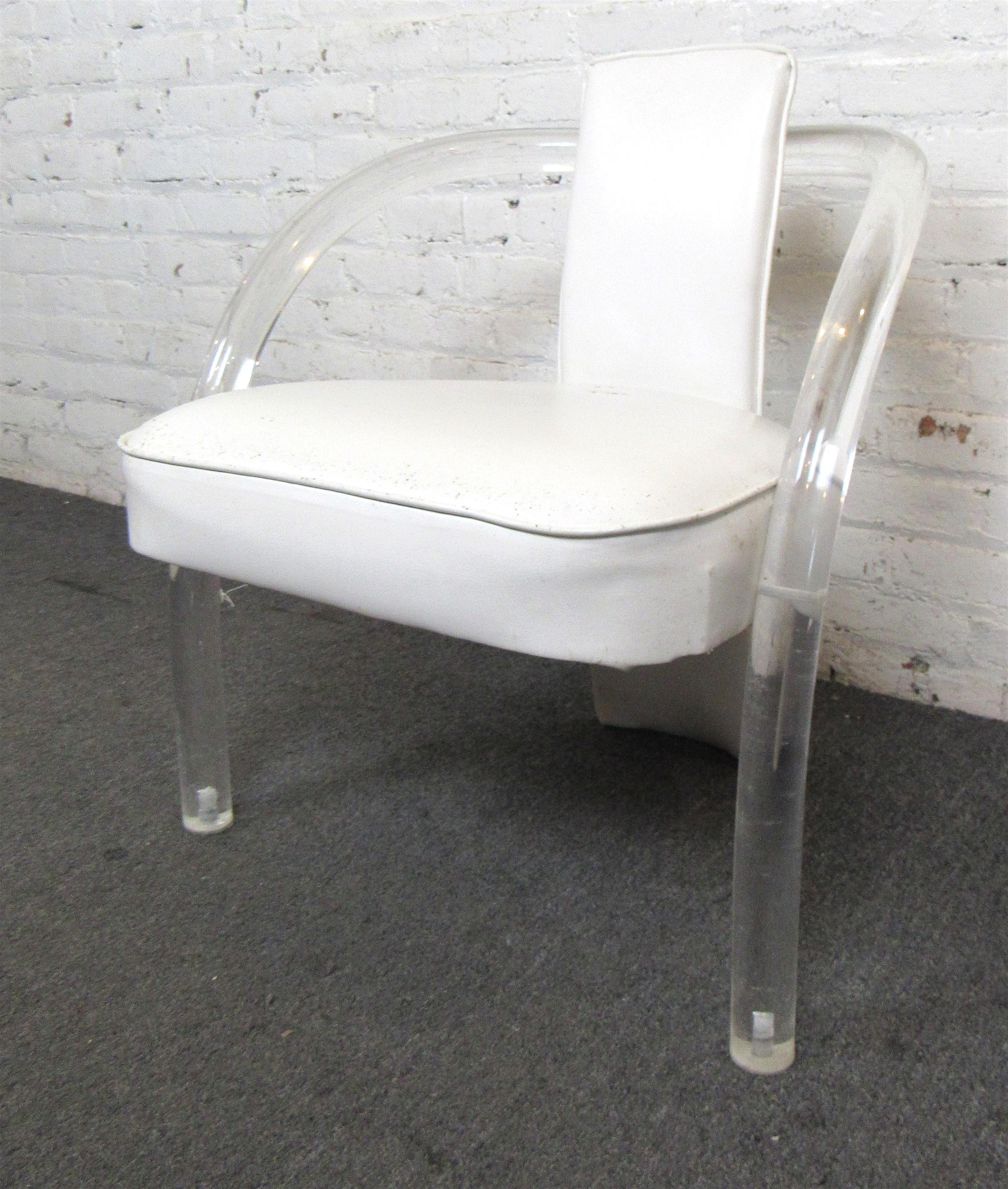 Mid-Century Modern acrylic arm chair with white vinyl back and seat. 
(Please confirm location NY or NJ).