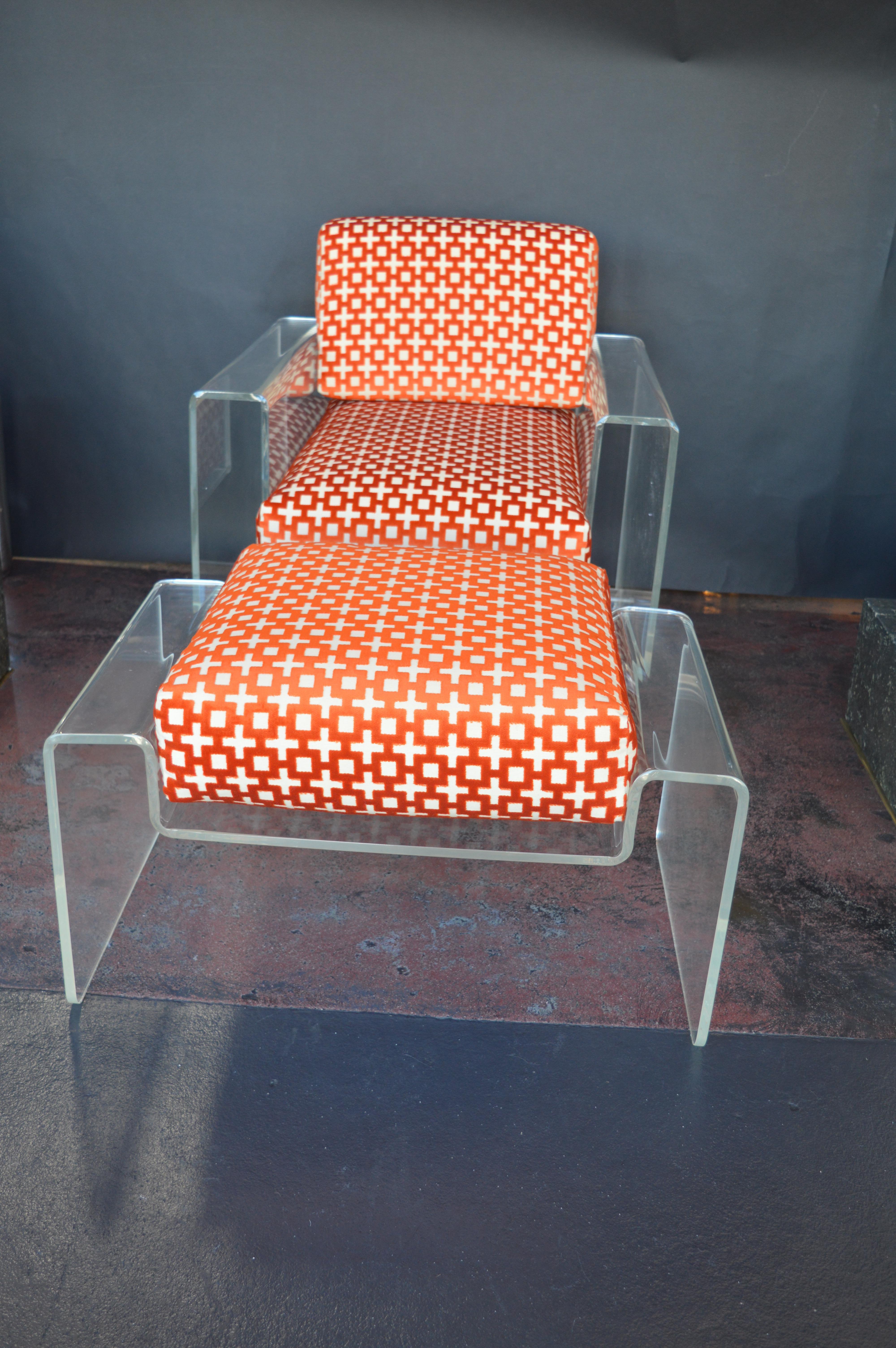 Mid-Century Modern Lucite armchair with matching Lucite ottoman.
Ottoman measures: 18 inches H x 30.25 inches W x 20.