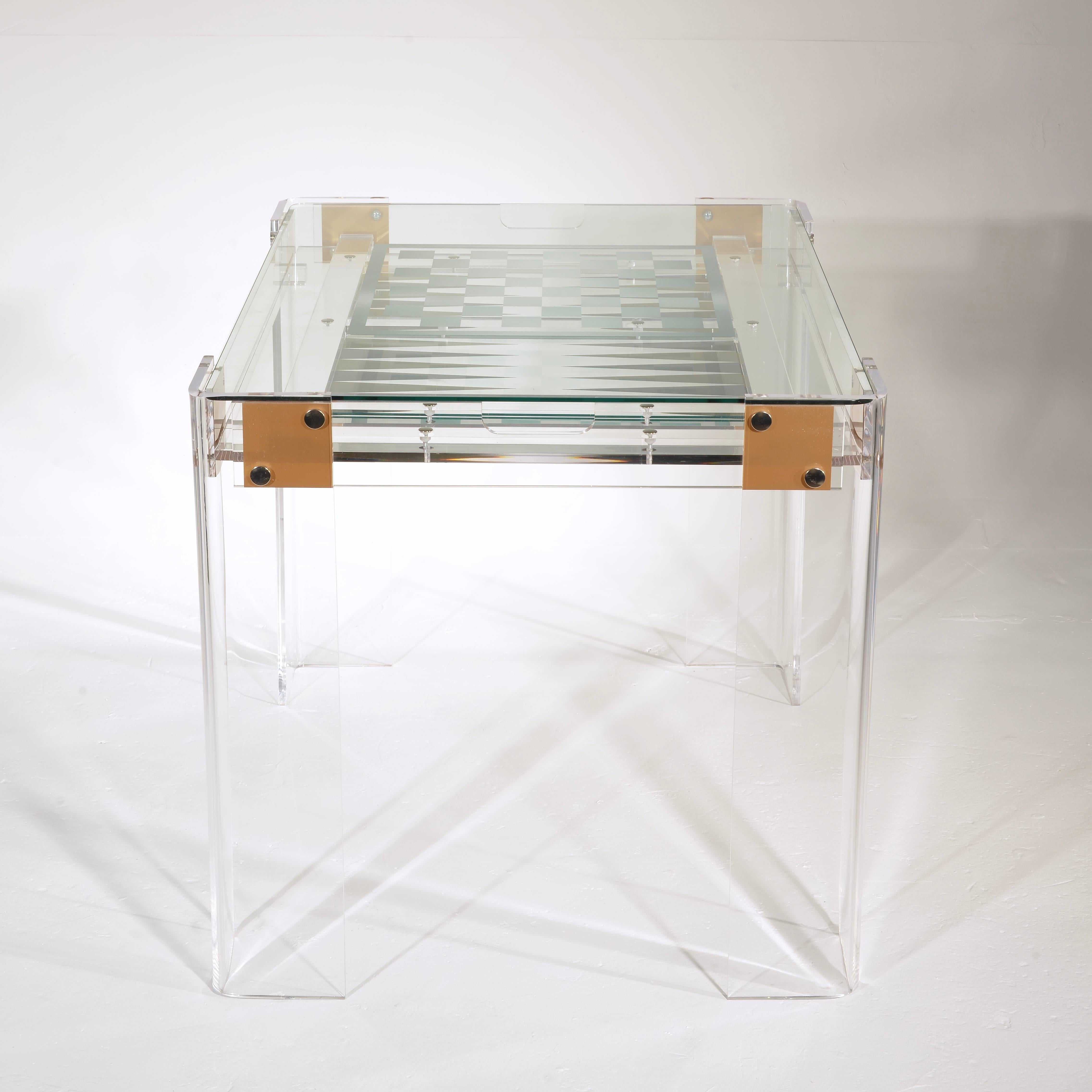 Gorgeous Lucite backgammon table with glass chess board removable top. In excellent condition.