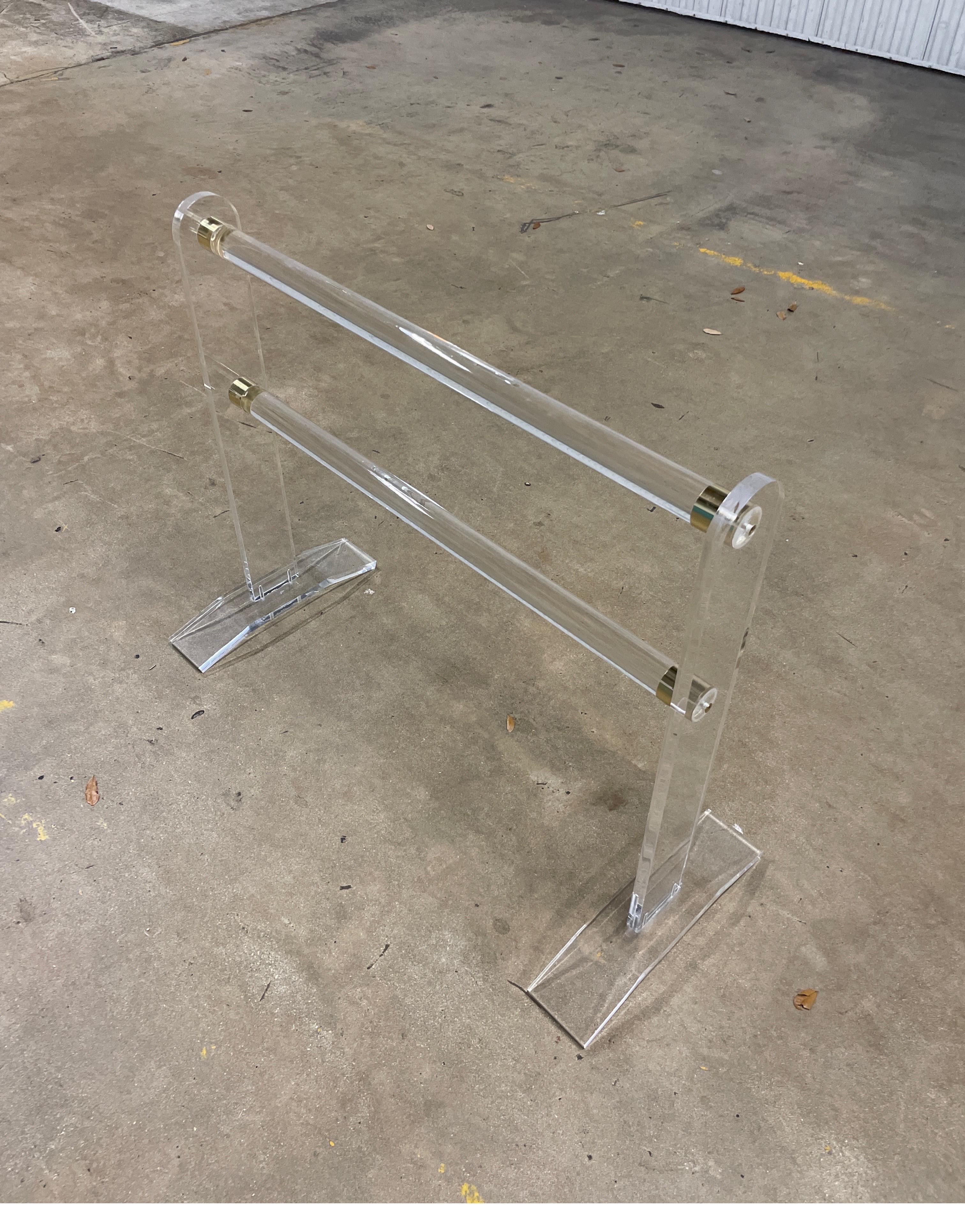Vintage sleek heavy lucite bedspread / quilt rack. Great invisible piece to hold your bedcovers. Very sturdy and in good condition.