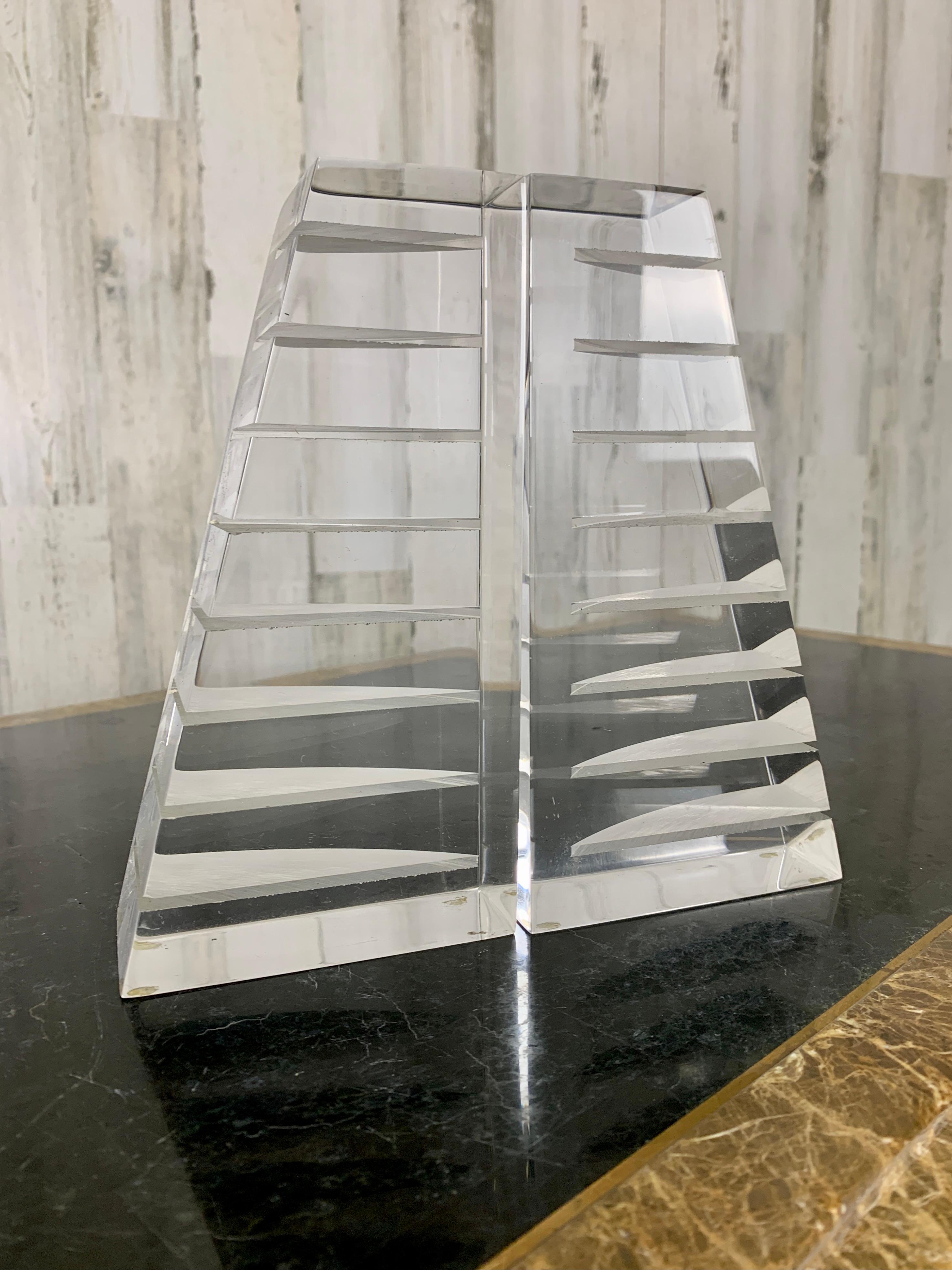 Lucite bookends by Herb Ritts for Astrolite, circa 1970s.