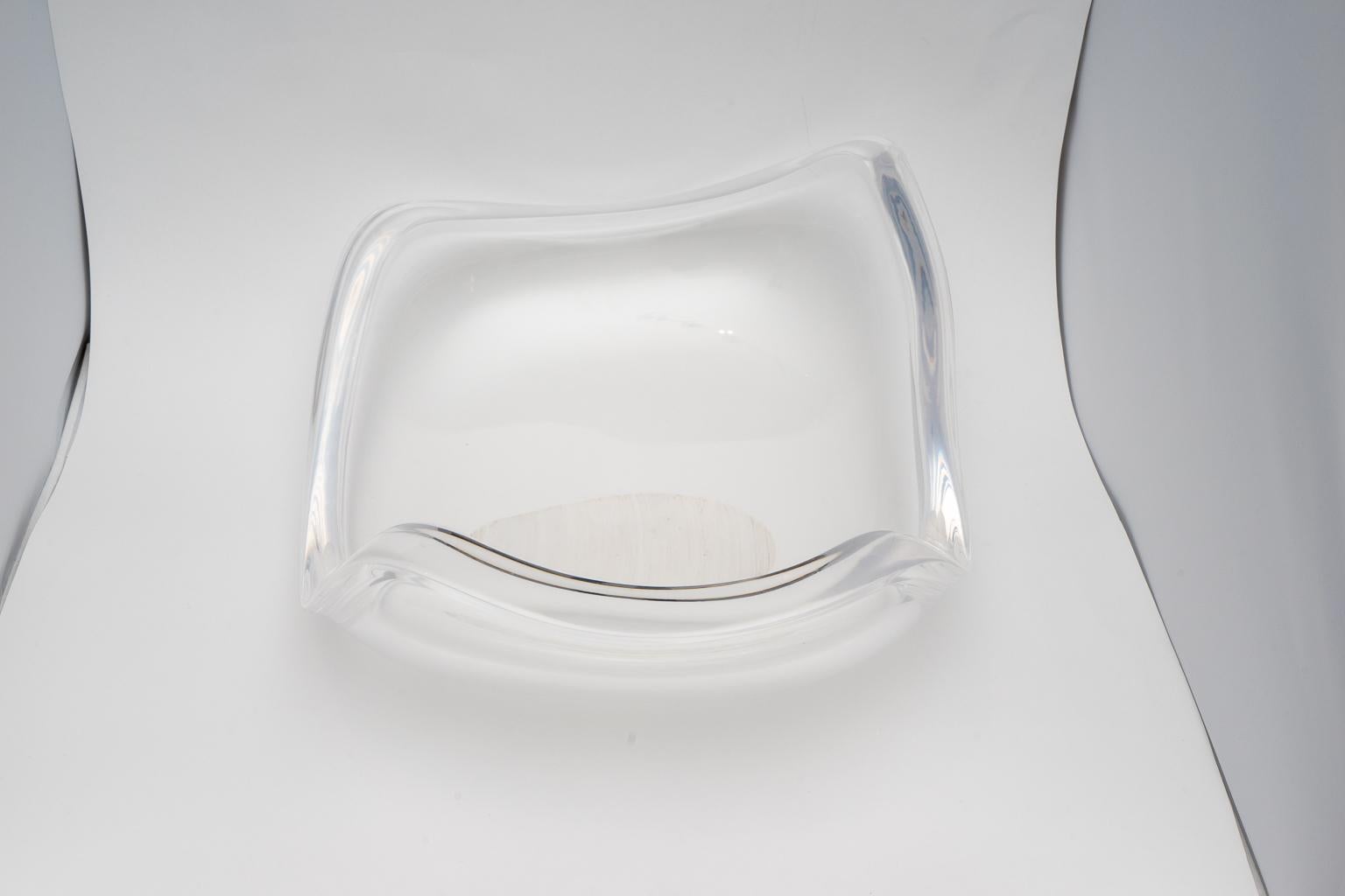 This stylish freeform Lucite bowl dates to the 1970s and was created by Ritts of LA and it has been professionally polished.

 