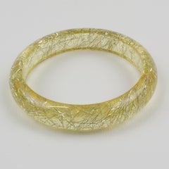 Pulsera brazalete de lucite Limón amarillo con inclusiones de hilo metálico plateado