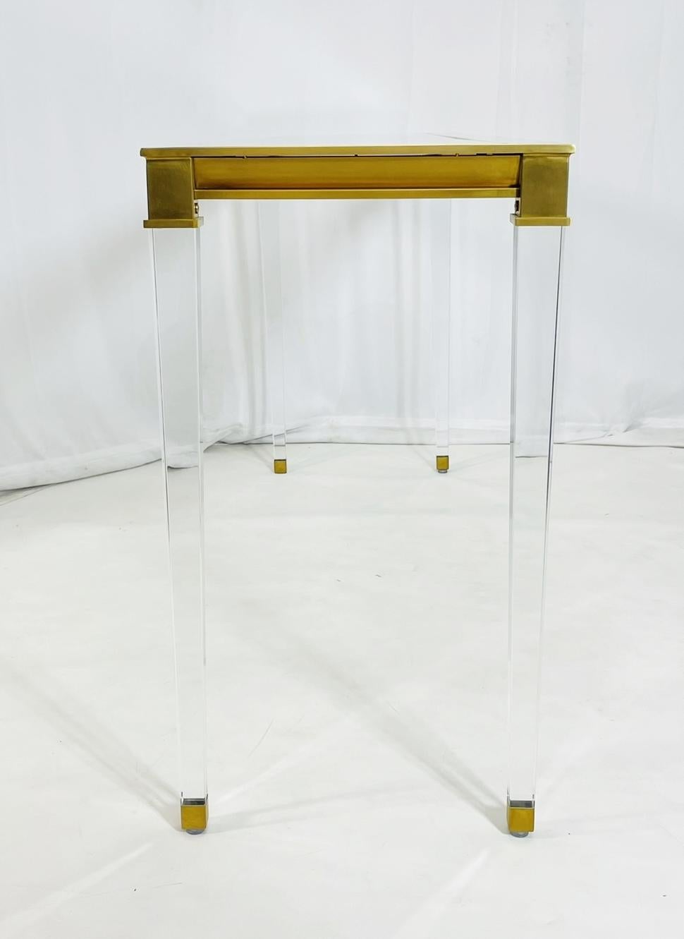 Contemporary Lucite & Brass Console Table With Glass Top after Charles Hollis Jones. For Sale