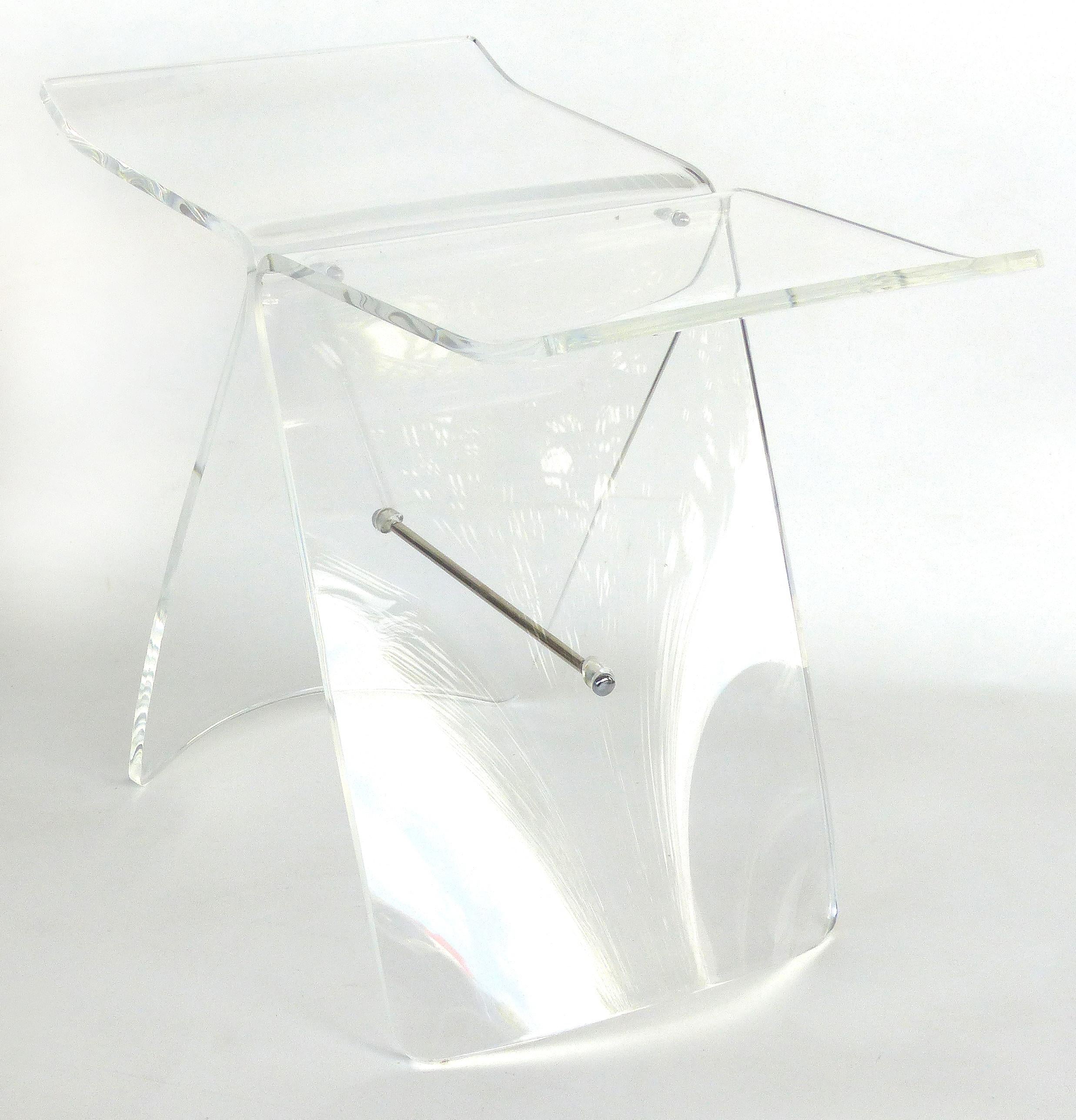 Lucite Butterfly Stool after Original by Sori Yanagi in Bentwood

A new custom Lucite butterfly stool after the original bentwood stool by Sori Yanagi. The stool has graceful curves and is accented with polished stainless steel hardware. The raised