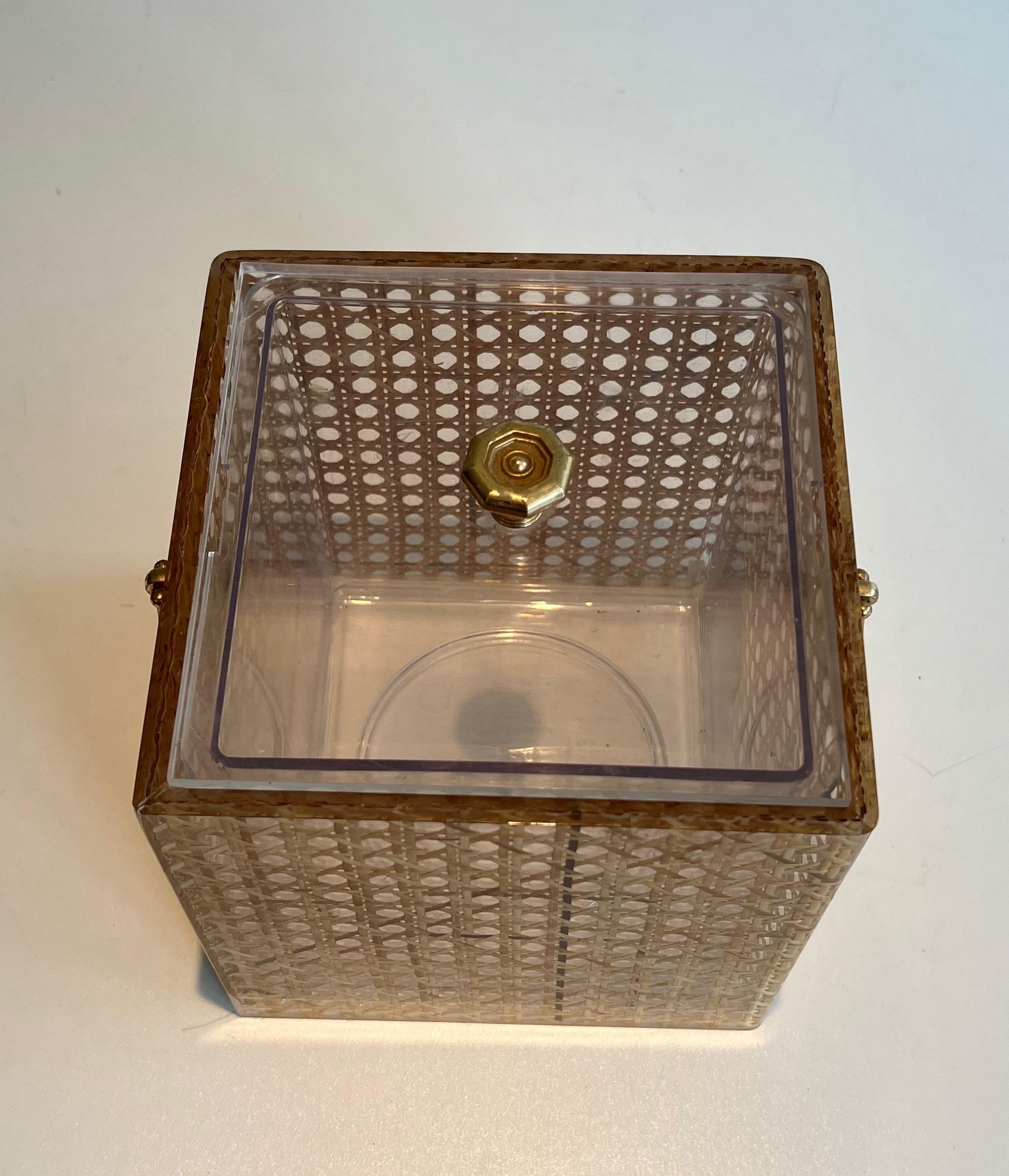 French Lucite, Caned and Brass Ice Bucket. Italian work in the style of Christian Dior  For Sale