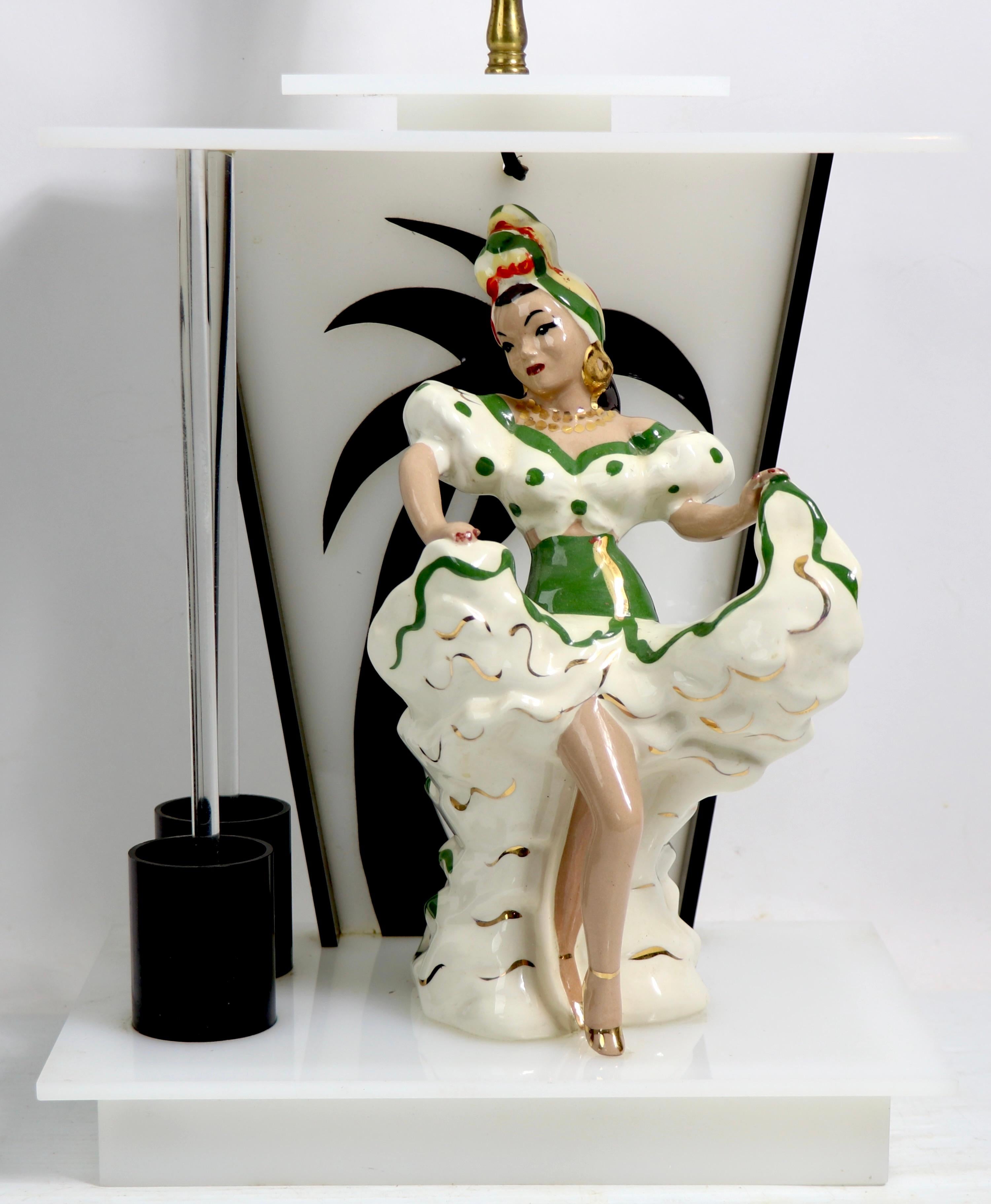 Classic Moss lamp of California, having a lucite base, with a ceramic figure ( Figure by DeLee Art ). The lamp is in very good estate condition, still having its original furry fabric shade ( shade shows some signs of age and use ). 
 Dimensions of