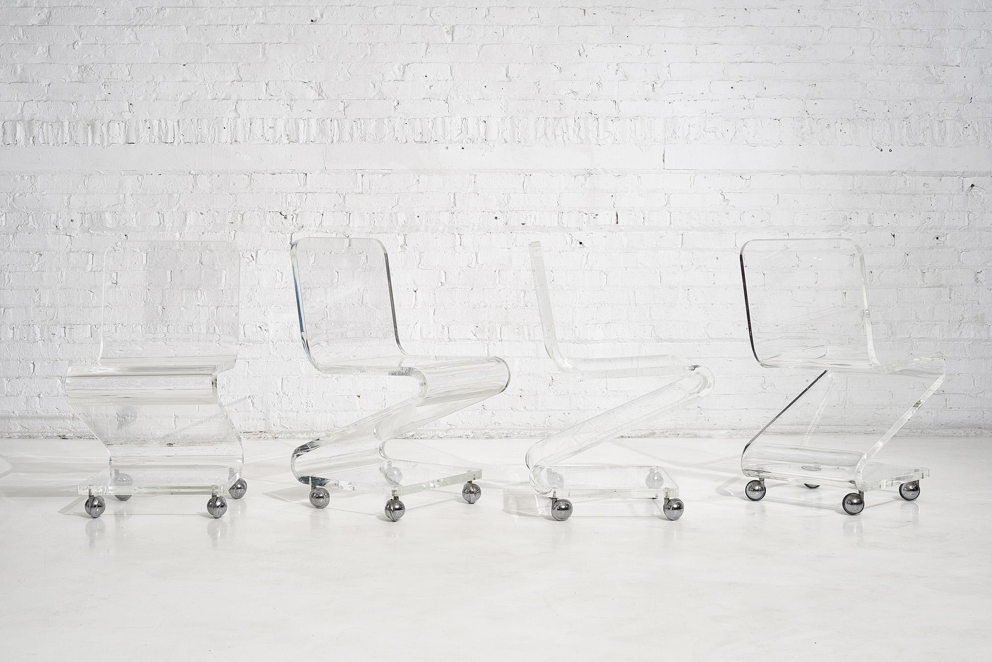 American Lucite Chairs on Casters, circa 1970, Les Prismatiques For Sale