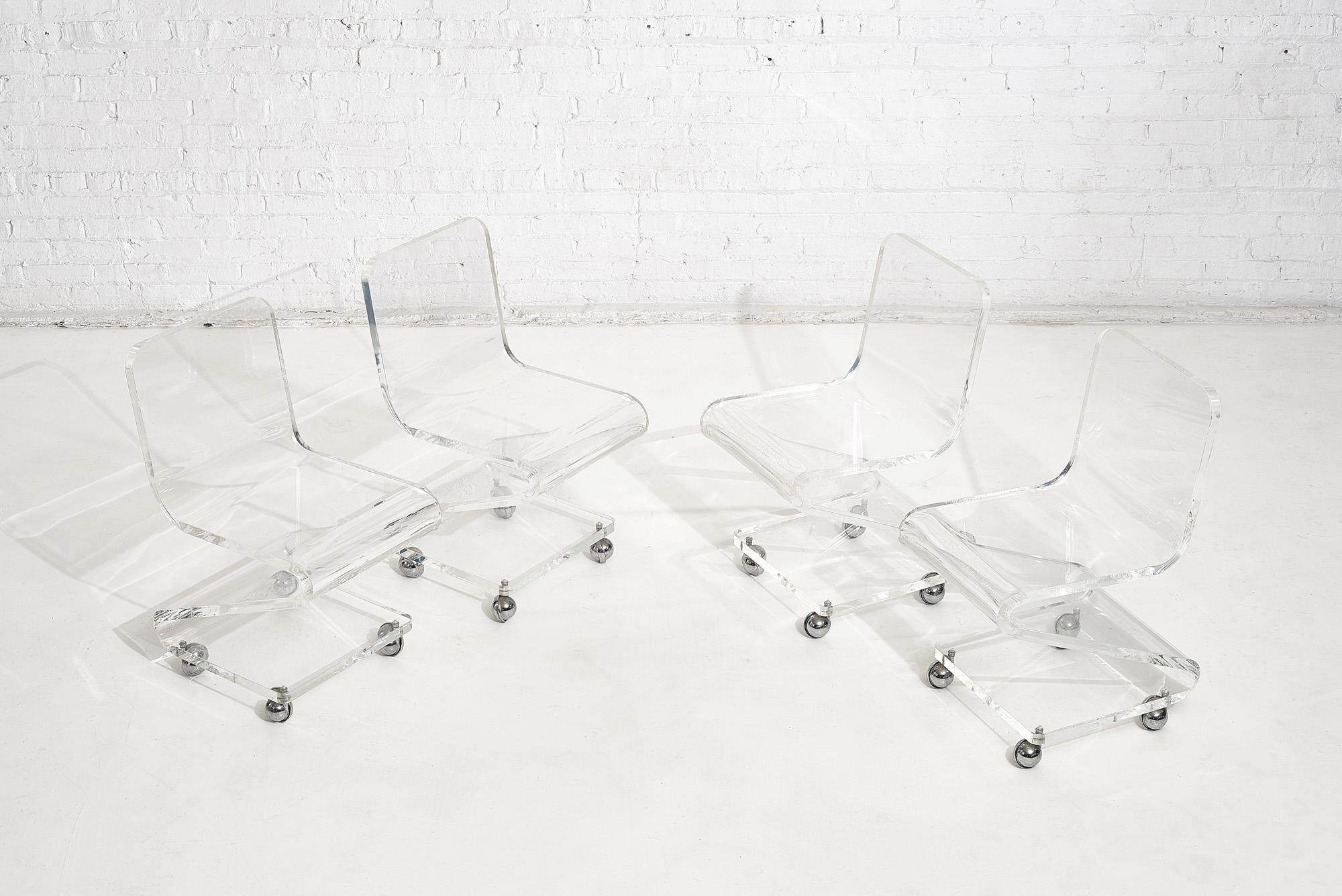 Late 20th Century Lucite Chairs on Casters, circa 1970, Les Prismatiques For Sale