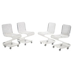 Lucite Chairs on Casters, circa 1970, Les Prismatiques
