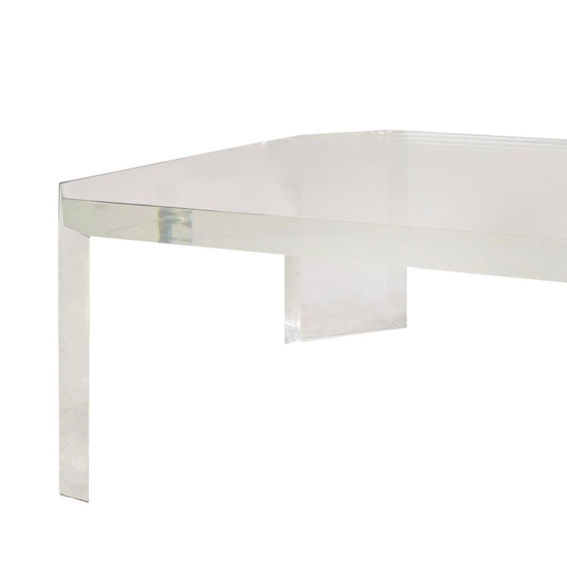Stunning rectangular lucite coffee table with canted corners by Charles Hollis Jones. In great condition.
Dimensions:
17