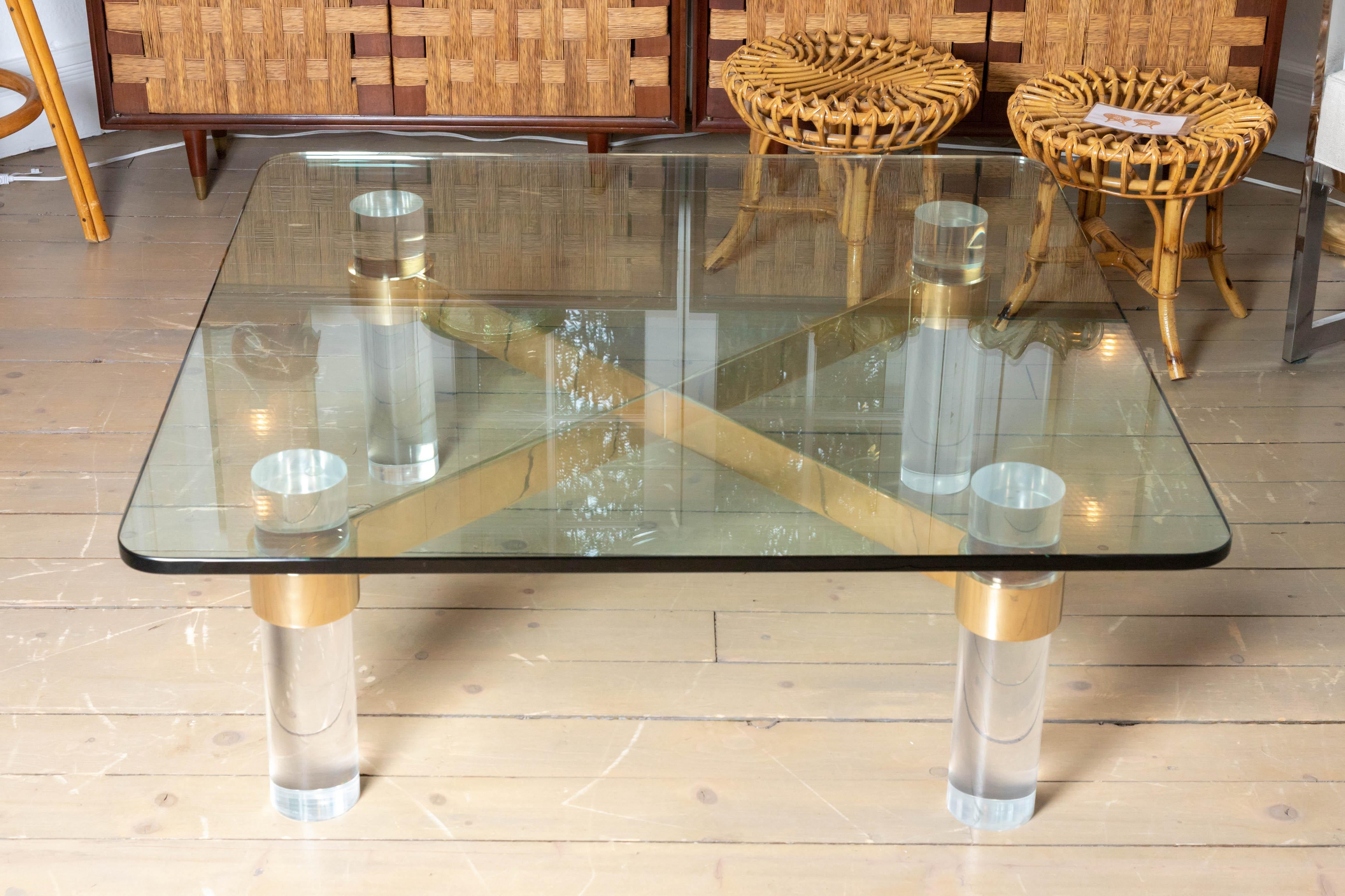 American Lucite Colulmns, Brass Cross Bars Base and Glass Top Coffee Table, Karl Springer