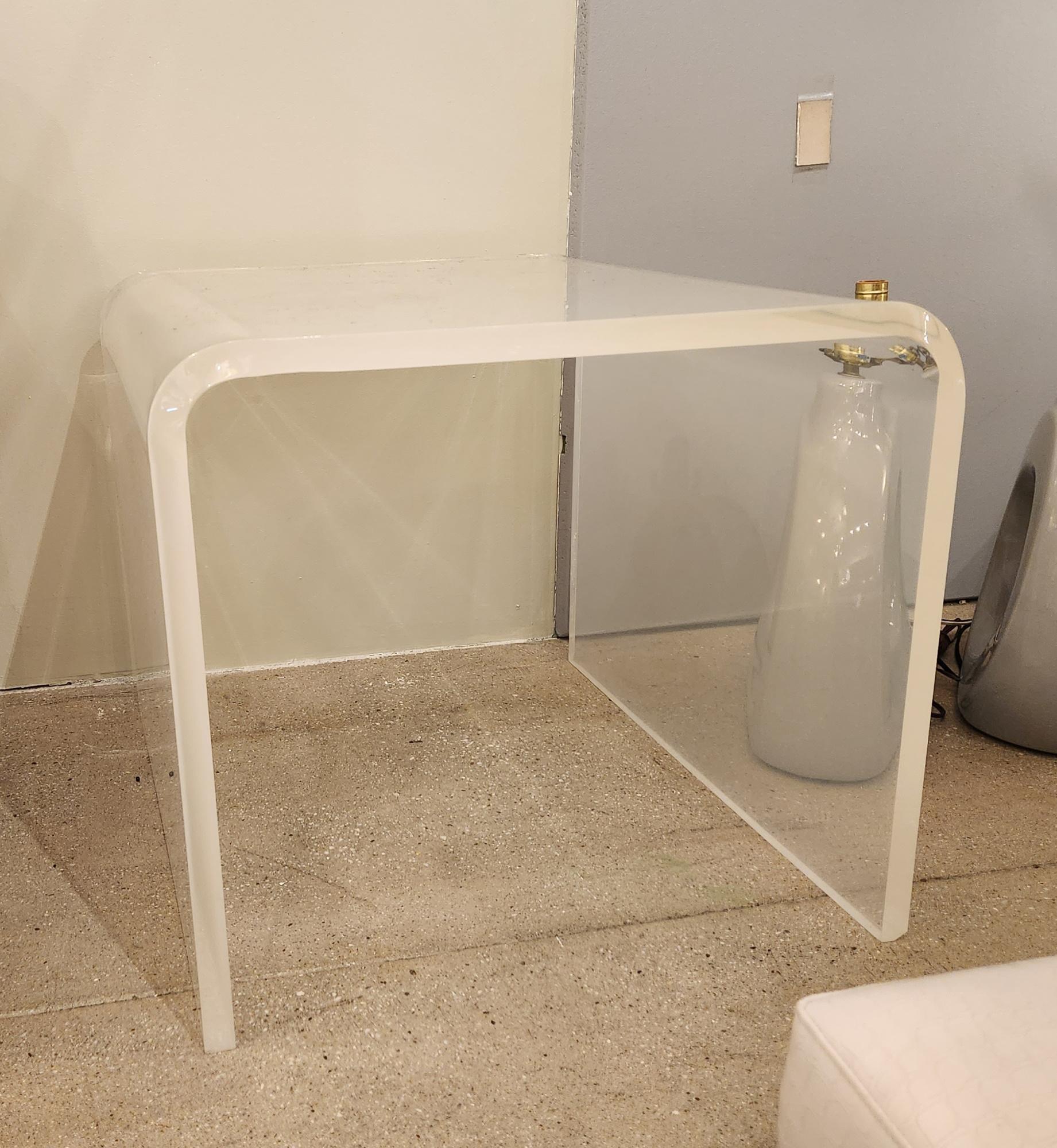 Lucite end table.