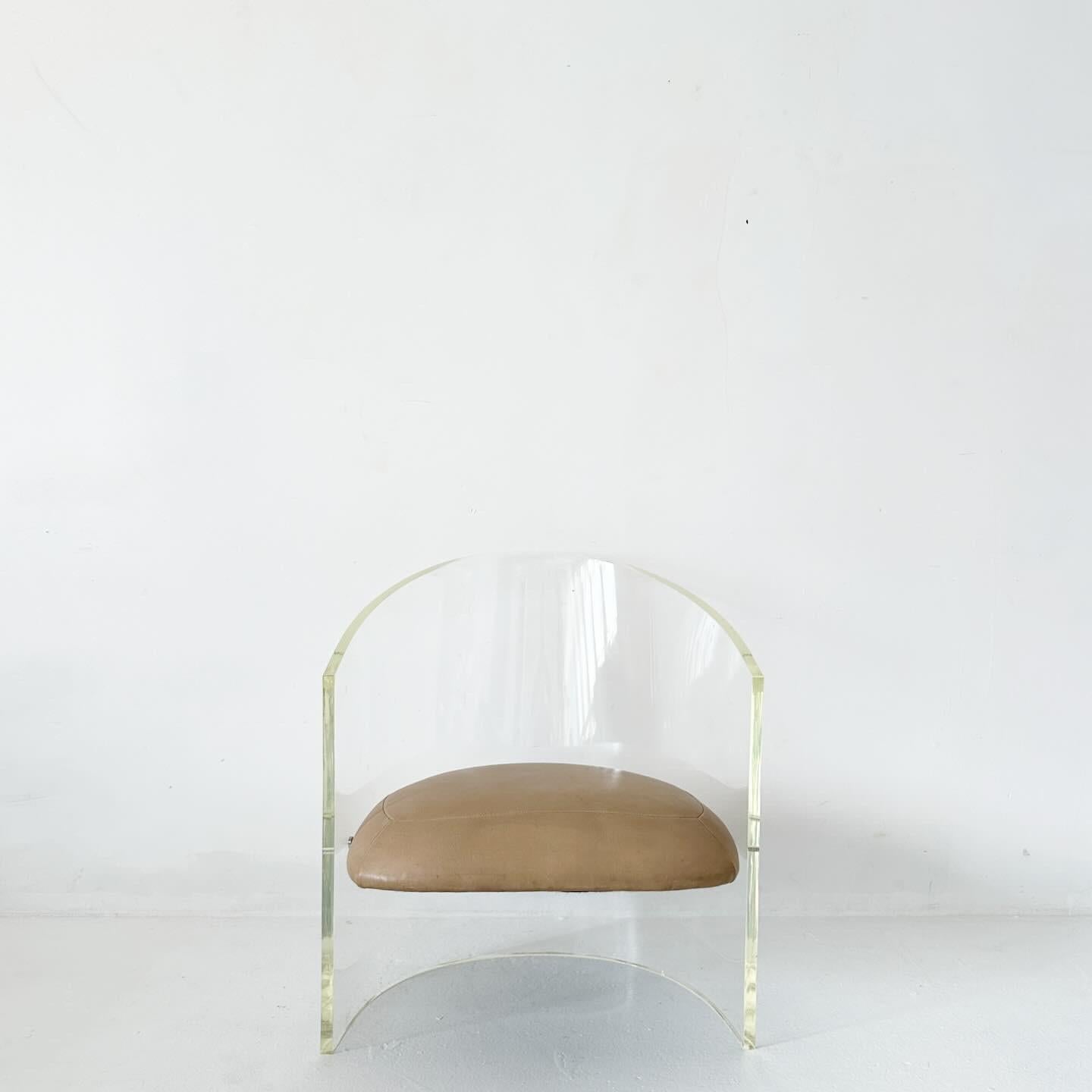 1970s lucite tub chair in manner of Vladimir Kagan. No marks to unsure if original, purchased at auction in Los Angeles.

Chair is vanity height and seat is original almond leather. Lucite is 3/4