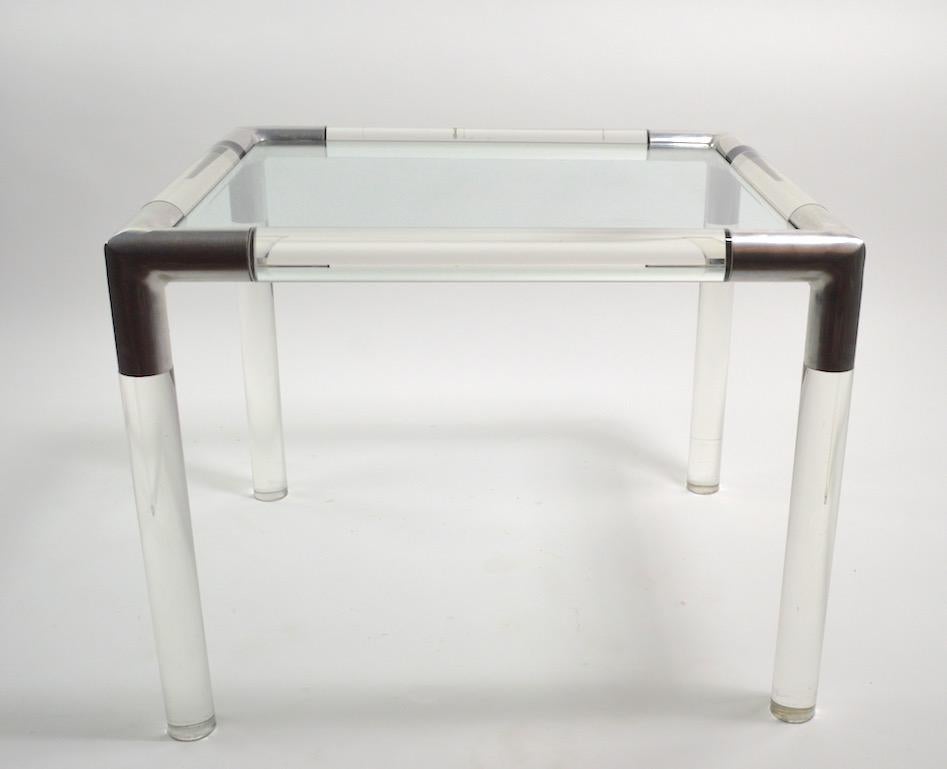 Thick Lucite rods with cast aluminium joinery and original plate glass top, designed by Charles Hollis Jones. This example is in very fine original condition, clean and ready to use. CHJ was known for his ultra chic urbane modern style, which this