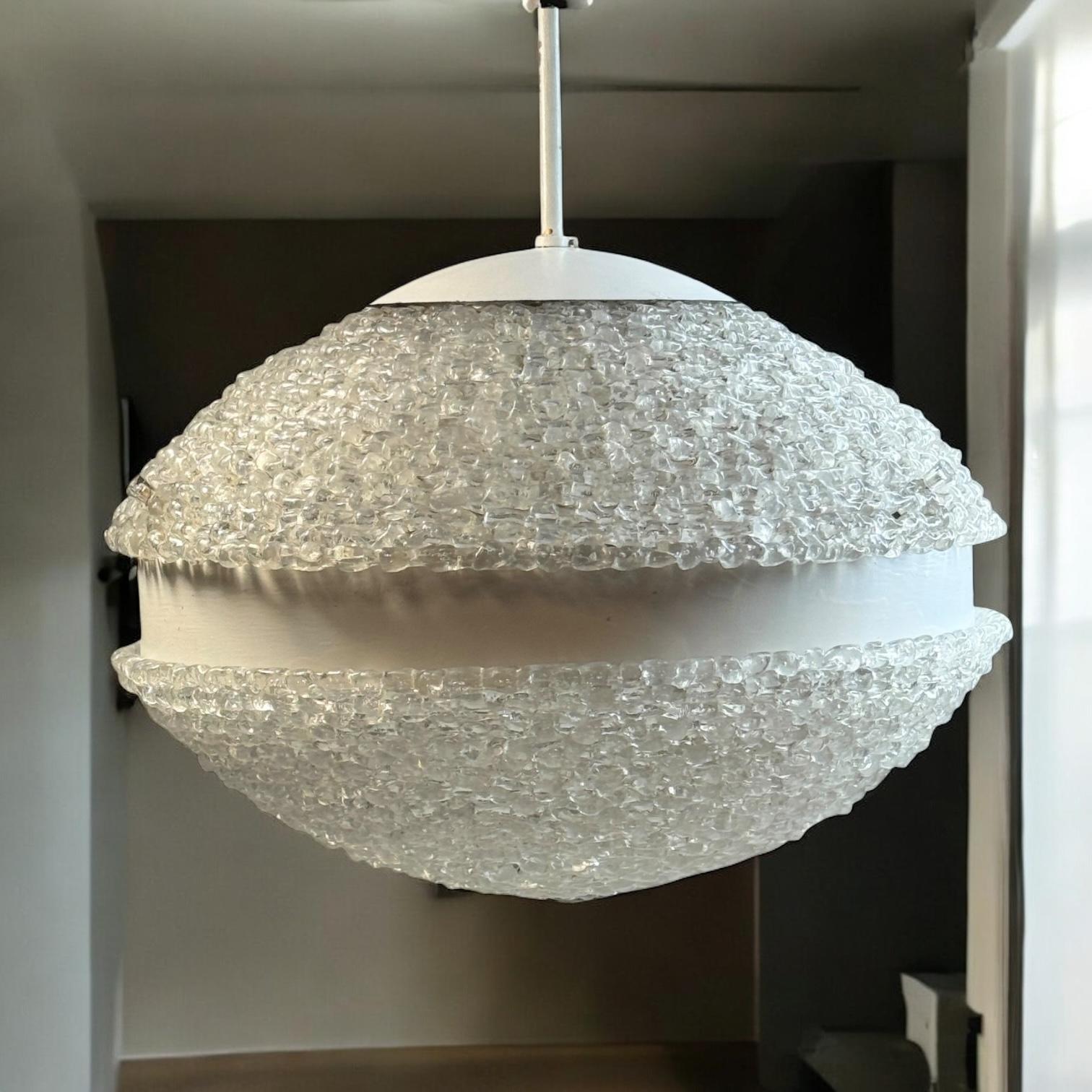 Beautiful chandelier or pendant light by Austrolux. An original mid-century vintage piece manufactured in the 1960s. It is made of metal and lucite. The Fixture requires six European E27 / 110 Volt Edison bulbs, each bulb up to 60 watts. It comes