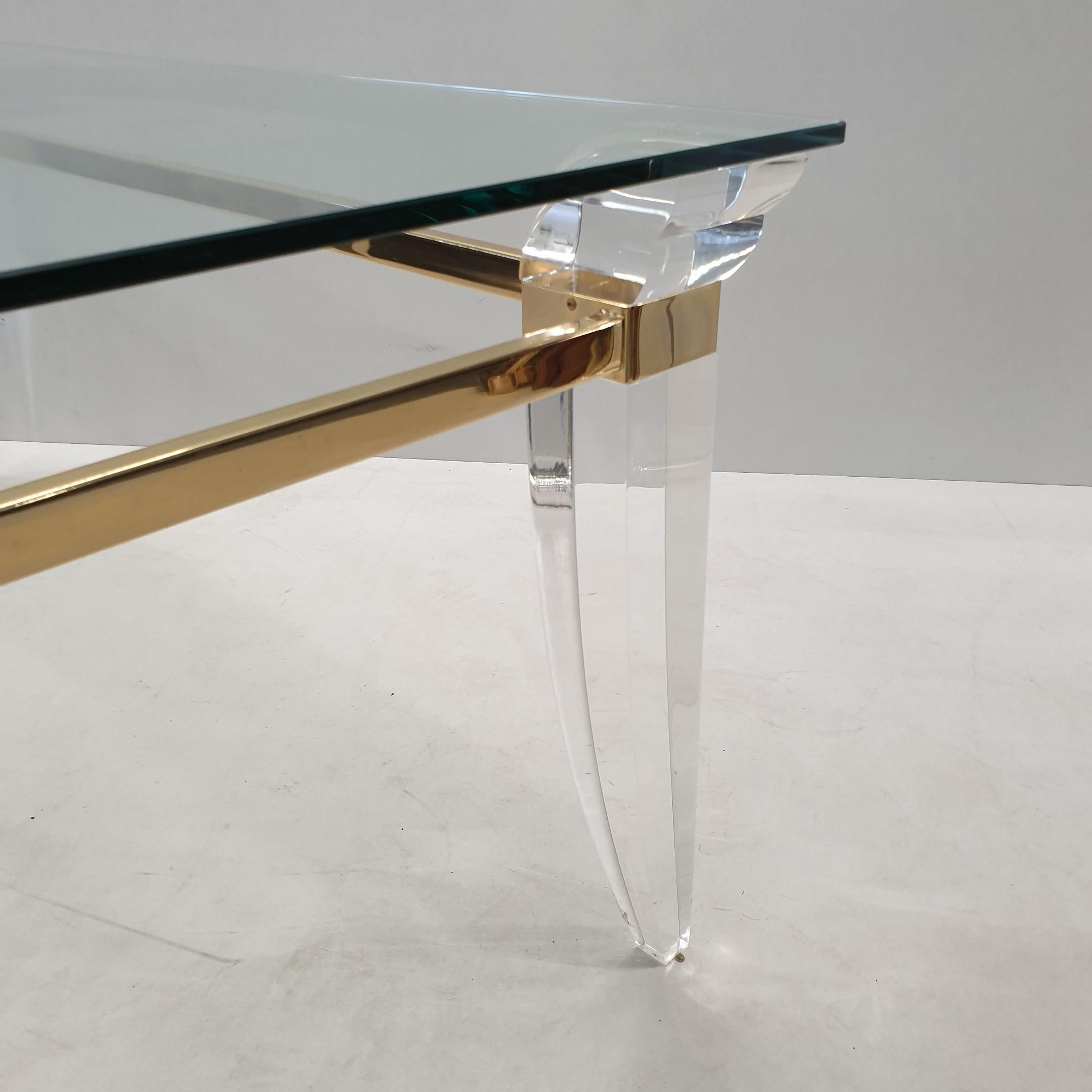 French Lucite, Gold Plating and Glass Coffee Table with Assymetrical Table Legs, 1980s For Sale