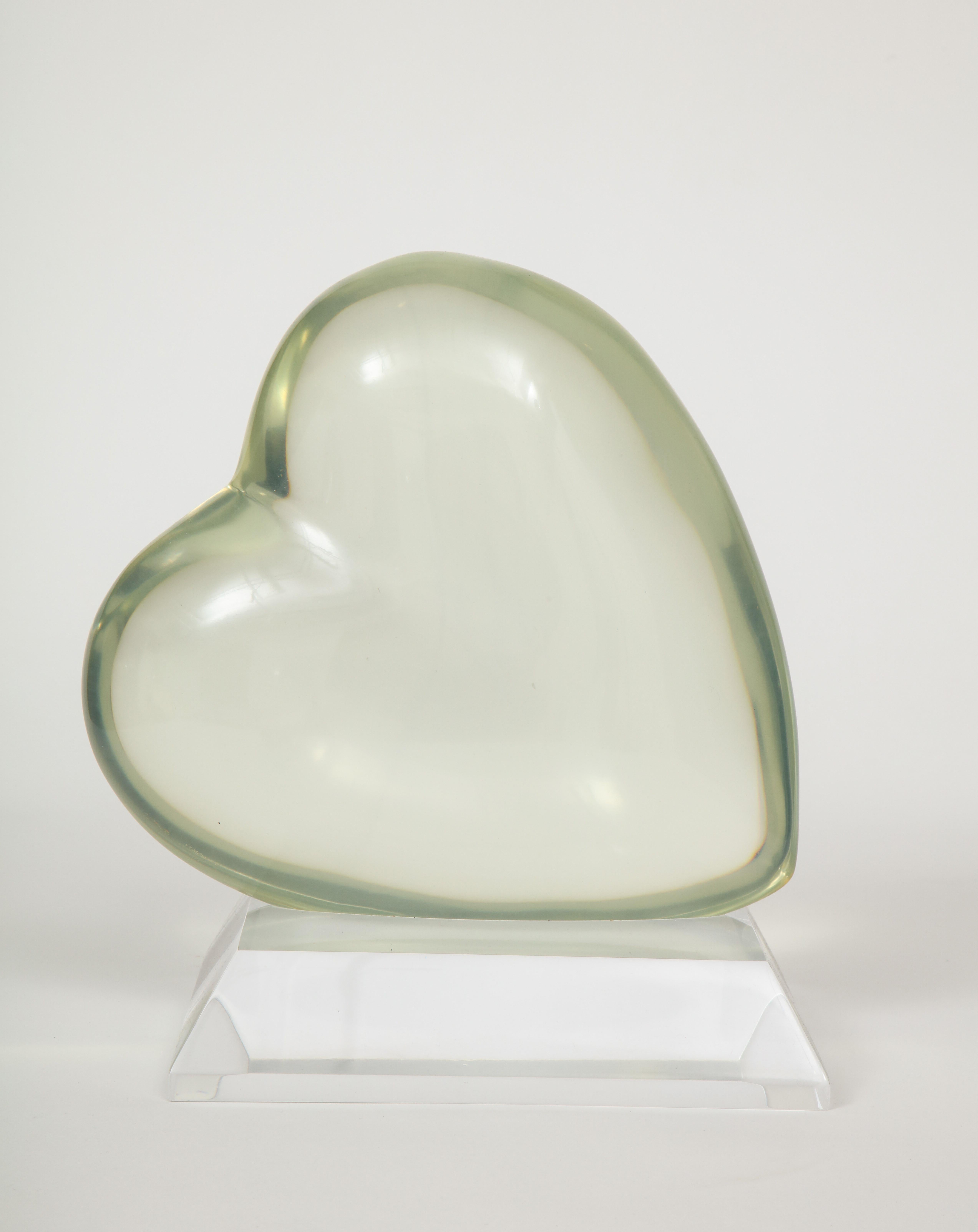 A good size Lucite heart sculpture that works well in most environments...always room for
more heart. The size of this particular sculpture is exceptional as the smaller ones are more available. Artist-signed.