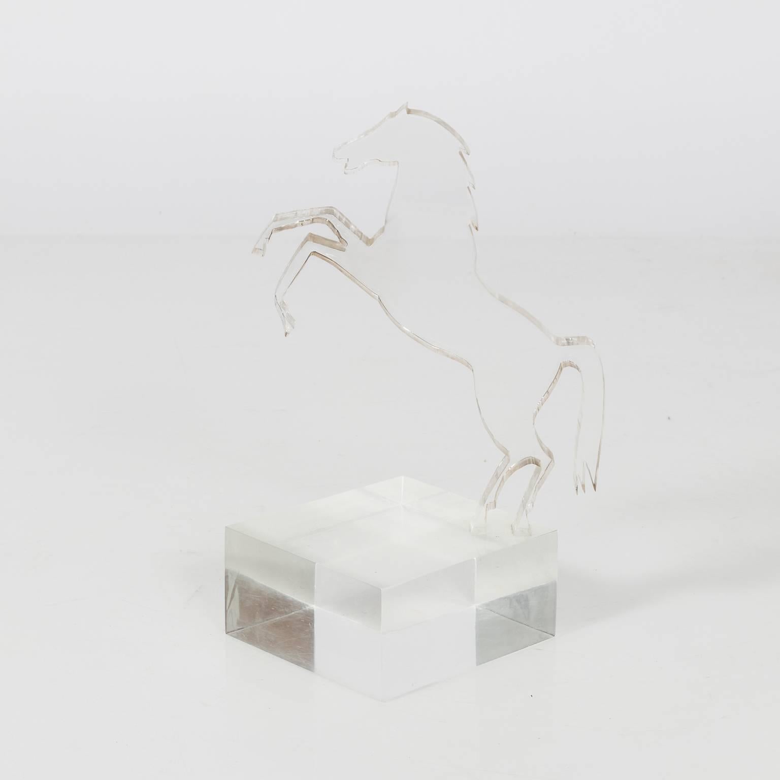 Italian Lucite sculpture depicting the silhouette of a horse on a Lucite base, circa 1970.
     