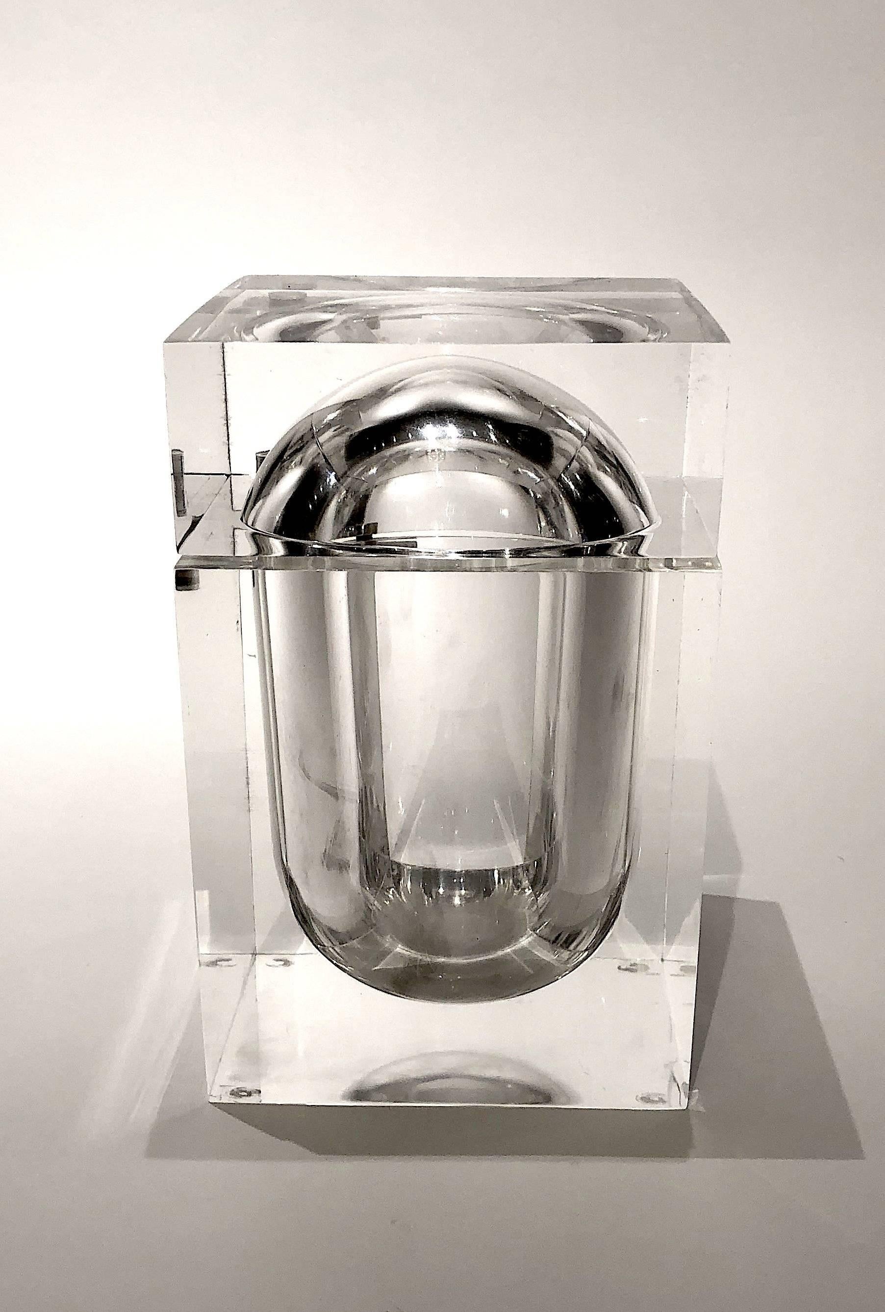 Vintage Lucite ice bucket canister with swiveling lid.