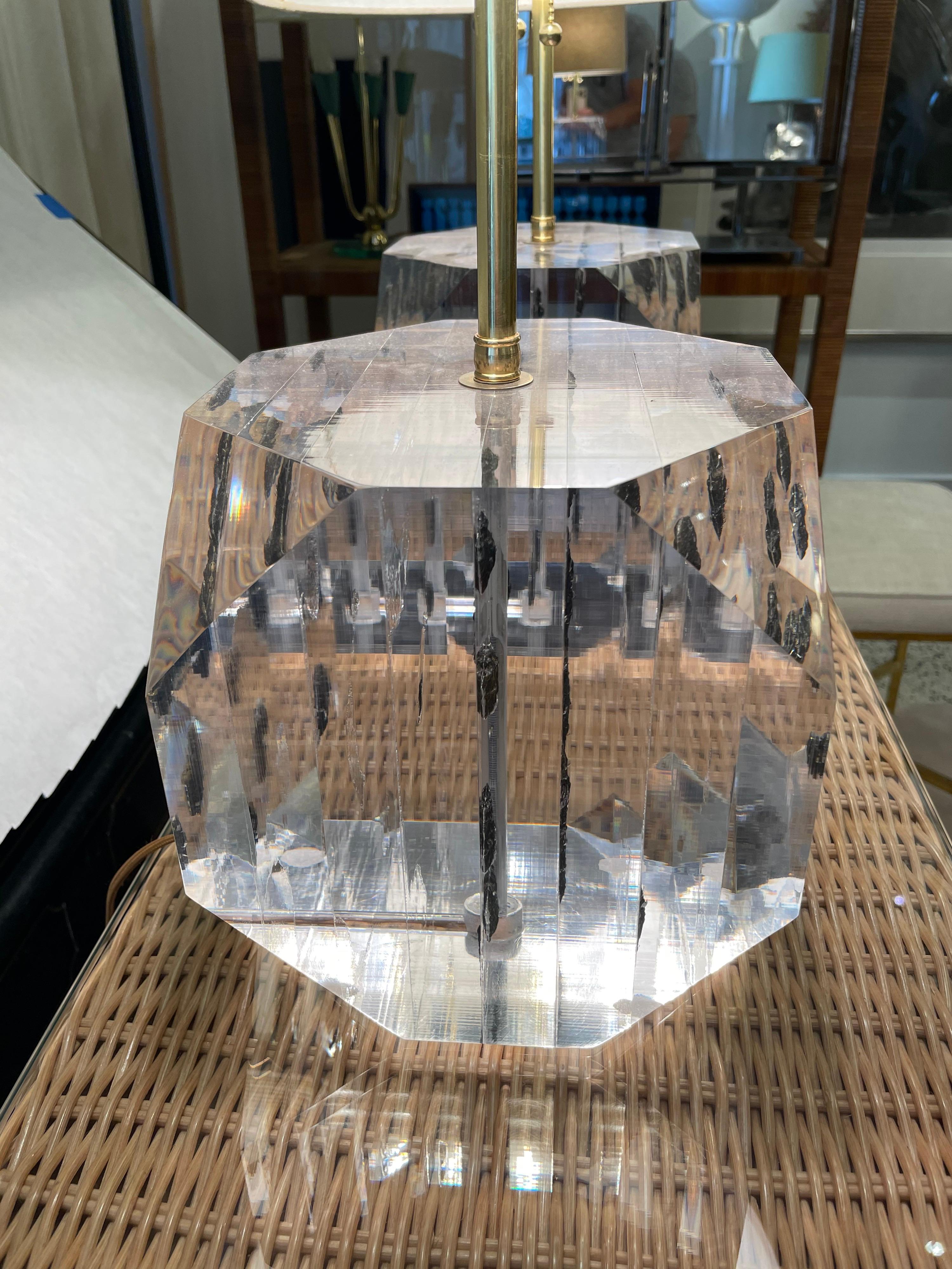 In hues of charcoal gray layered within these thick Lucite sheets, these table lamps are very heavy and quality crafted. Rewired with double cluster sockets and nickel pulls, silk wiring. by Freda Koblick. Dimensions of Large hexagonal Lucite base