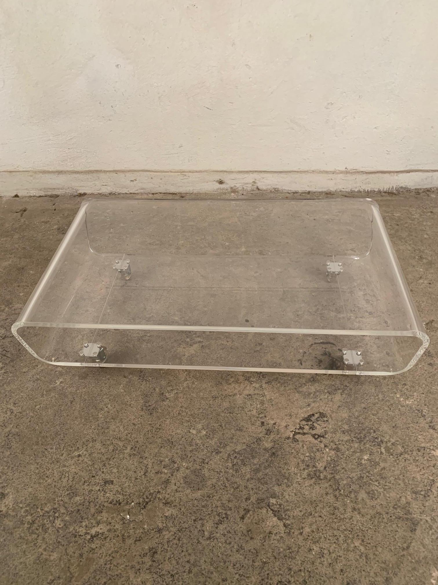 Lucite mobile coffee table, France, 1970s fully original. Attractive, timeless form.