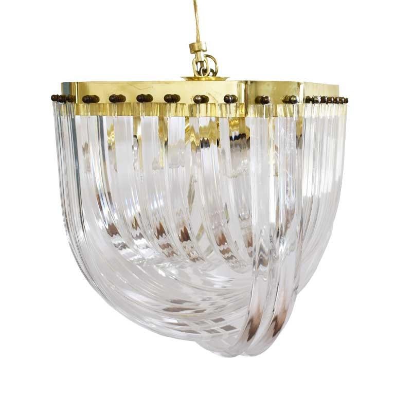 Midcentury clear Lucite ribbon swag prism chandelier, in the style of Carlo Nason or Triedri. This beautiful curved chandelier features pieces of curved Lucite or acrylic rods suspended in alternate intertwining loops to 
 a square hexagonal shape